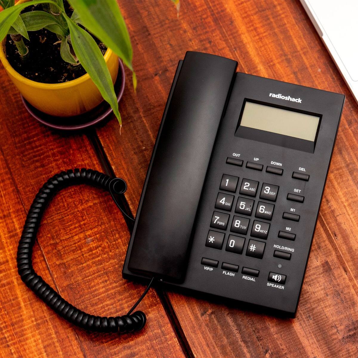 radioshack

OUT UP DOWN DEL 1 2 3 SET 4 5 6 M1 7 8 9 M2 * 0 # HOLD/RING VIPIP FLASH REDIAL SPEAKER