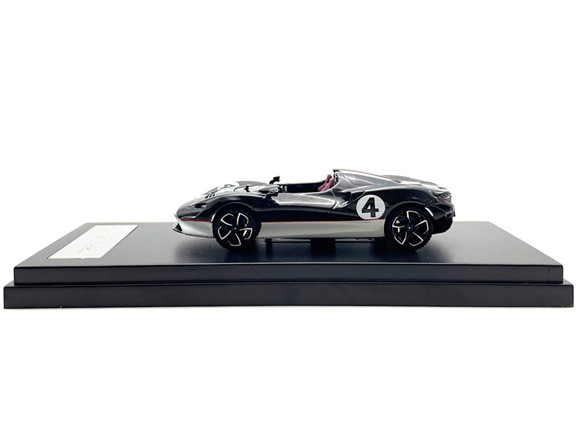 Angle. LCD Models - McLaren Elva Convertible #4 Carbon Black with White and Red Stripes 1/64 Diecast Model Car by LCD Models - Carbon Black with White and Red.
