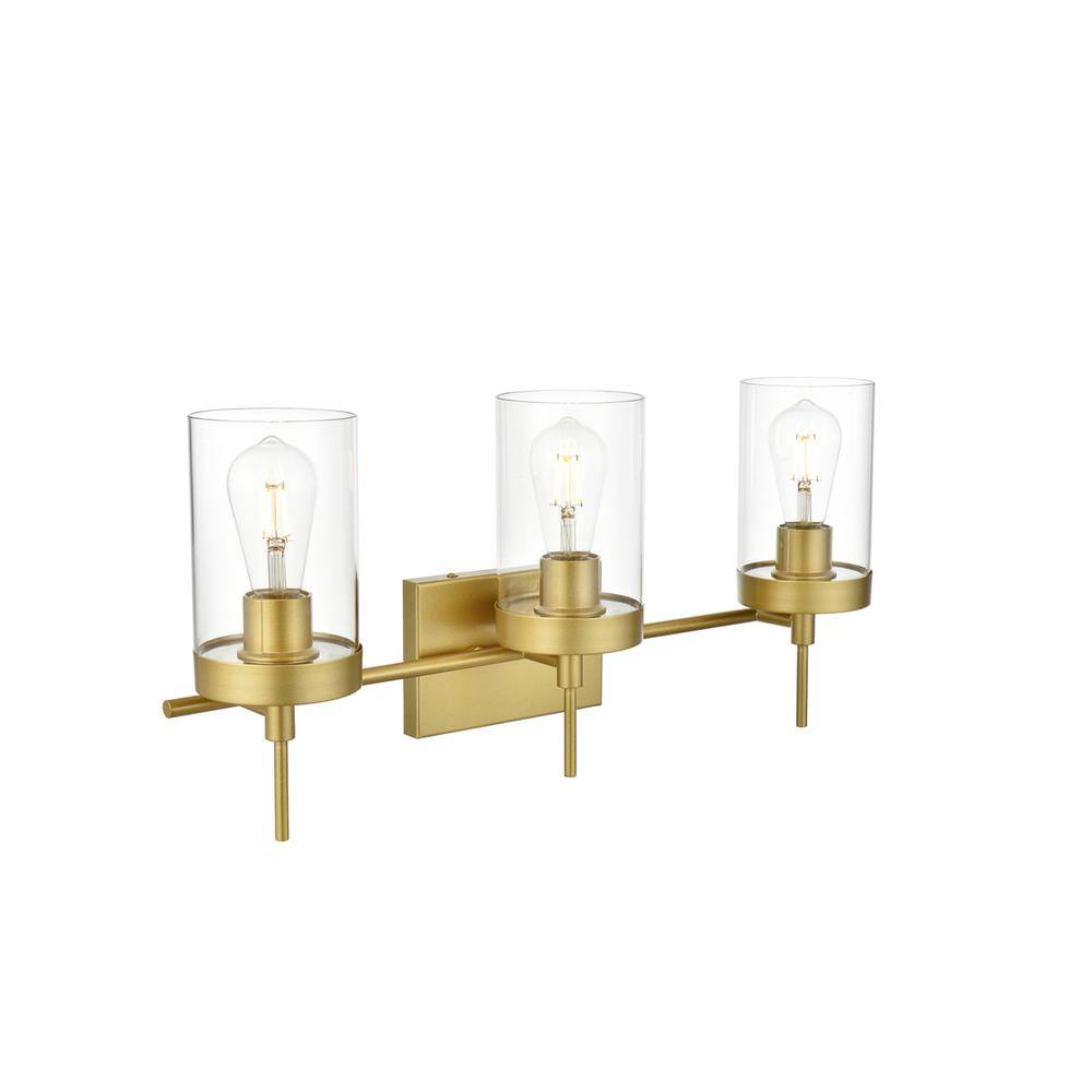 Back. Living District - Benny 3 light Brass and Clear Bath Sconce - Brass And Clear.