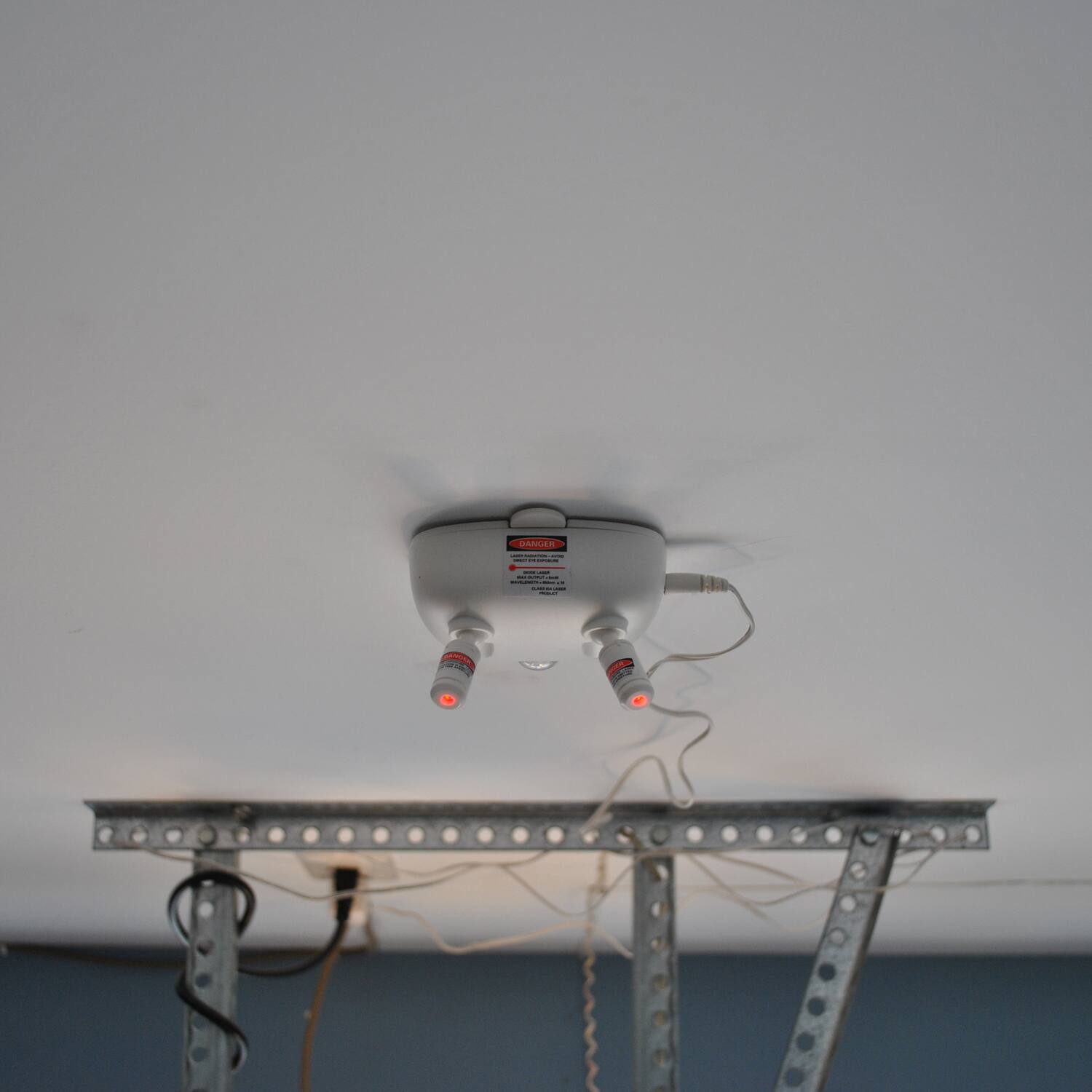 The text on the image reads:

"DANGER
DO NOT REMOVE COVER
DO NOT OPEN
FOR USE WITH
120V AC ONLY
MADE IN CHINA"