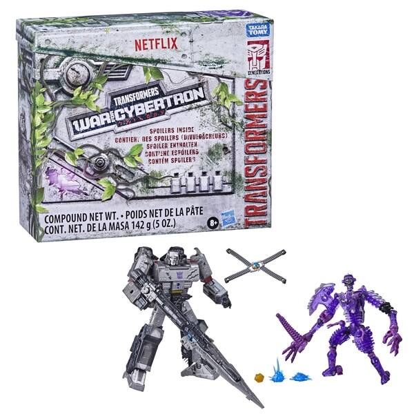 TKARA TOMY NETFLIX CENEGSTIONS TRANSFORMERS WARCYBERTRON SPOILERS INSIDE CONTIEN. DES SPOILERS (DIVULOSCHEURS) SFAILER ENTHALTEX CONTINE ESPOILERS TRANSFORMERS CONTM SPGILERS POIDS NET DE LA PTE COMPOUND NET WT. MASA 142 (5 OZ.) 8+ CONT. NET. DE LA g!

Corrected text from the image:

NETFLIX  
TKARA TOMY  
TRANSFORMERS  
WAR CYBERTRON  
SPOILERS INSIDE  
CONTIENT DES SPOILERS (DIVULGATEURS)  
SPOILER ENTHALTEX CONTINE ESPOILERS  
TRANSFORMERS  
POIDS NET DE LA PTE COMPOUND NET WT.  
MASA 142 g (5 OZ.)  
8+  
CONT. NET. DE LA MASA 142 g (5 OZ.)