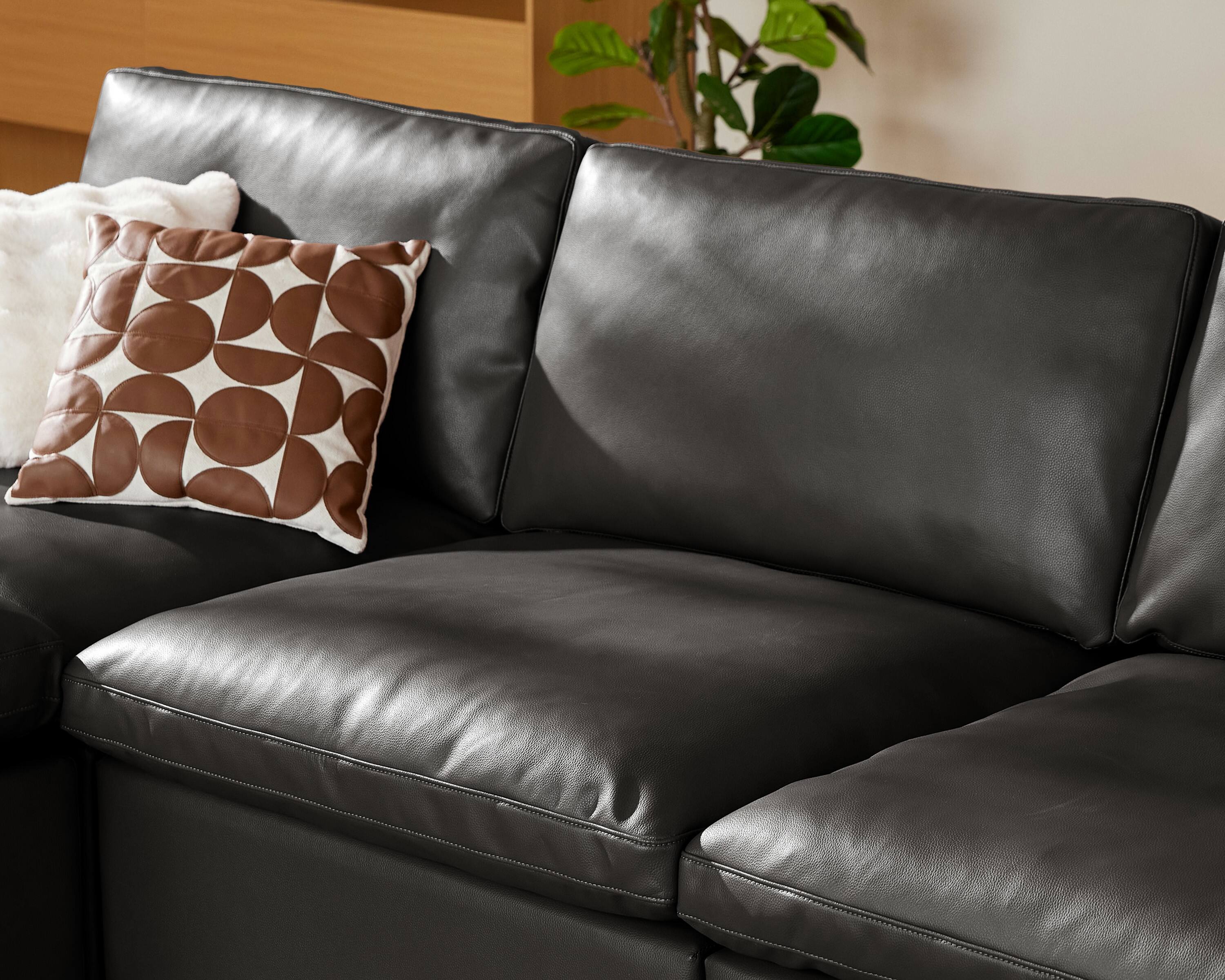 Alt View 1. Dyonery - 120" U Shaped  Couch with Storage Ottoman， Down-Filled Wide Deep Seat, Solid Wood Frame, Tool Free, Faux Leather Black - Black.