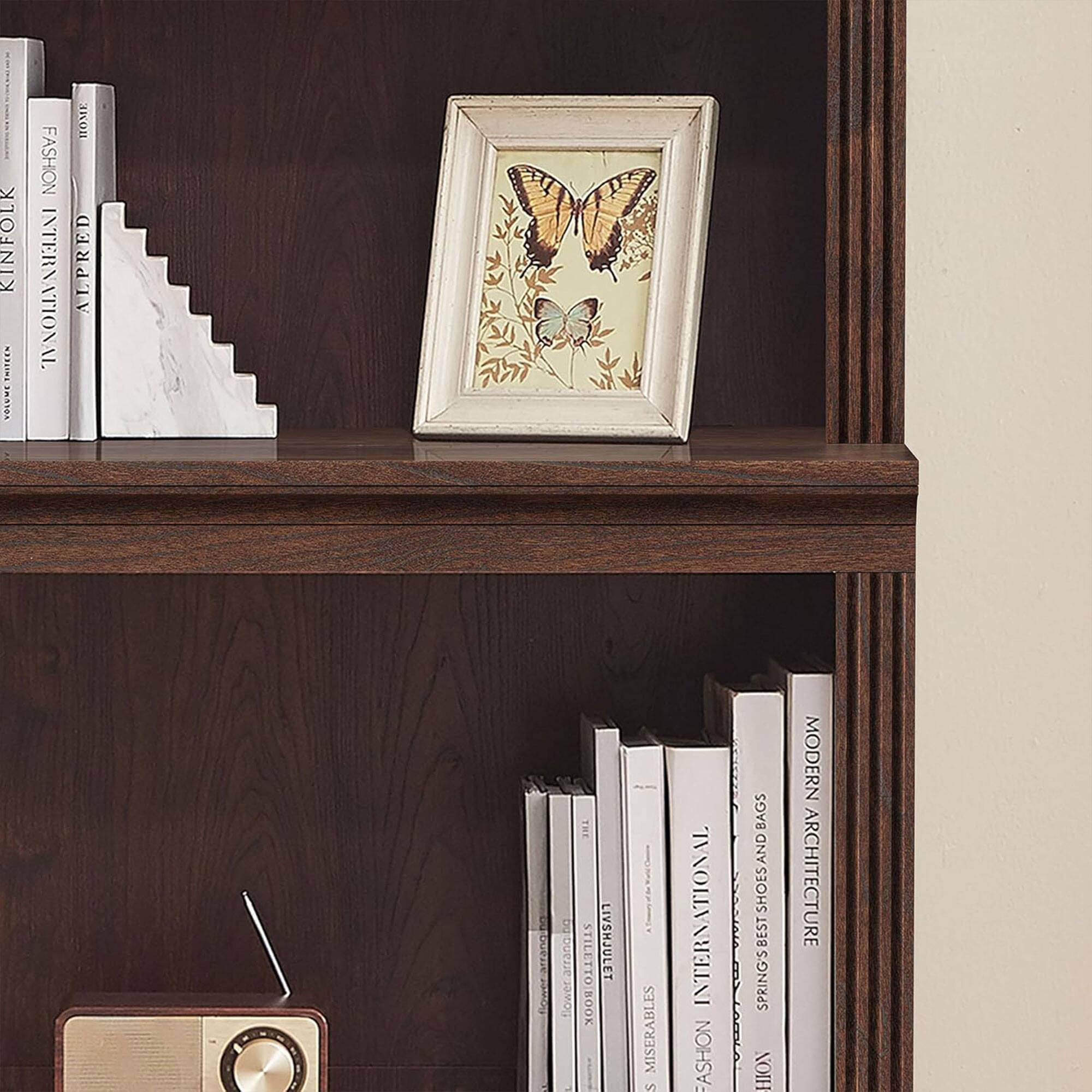 Sure, here is the corrected and grouped text from the image:

**Top Shelf:**
- KINFOLK
- FASHION INTERNATIONAL
- THE STILETTO BOOK
- LIVSHJULET
- MISERABLES

**Middle Shelf:**
- FASHION INTERNATIONAL
- BAGS
- SHOES
- SPRING'S BEST
- MODERN ARCHITECTURE

**Bottom Shelf:**
- MODERN ARCHITECTURE
- FASHION INTERNATIONAL
- MISERABLES
- FASHION INTERNATIONAL
- FASHION INTERNATIONAL
- FASHION INTERNATIONAL
- FASHION INTERNATIONAL
- FASHION INTERNATIONAL
- FASHION INTERNATIONAL
- FASHION INTERNATIONAL
- FASHION INTERNATIONAL
- FASHION INTERNATIONAL
- FASHION INTERNATIONAL
- FASHION INTERNATIONAL
- FASHION INTERNATIONAL
- FASHION INTERNATIONAL
- FASHION INTERNATIONAL
- FASHION INTERNATIONAL
- FASHION INTERNATIONAL
- FASHION INTERNATIONAL
- FASHION INTERNATIONAL
- FASHION INTERNATIONAL
- FASHION INTERNATIONAL
- FASHION INTERNATIONAL
- FASHION INTERNATIONAL
- FASHION INTERNATIONAL
- FASHION INTERNATIONAL
