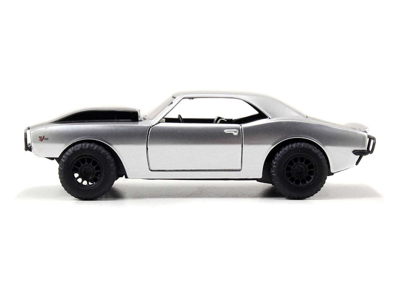 Angle. Jada - Roman's Chevrolet Camaro Z/28 Silver with Black Stripes "Fast & Furious 7" (2015) Movie 1/32 Diecast Model Car by Jada - Silver with Black.