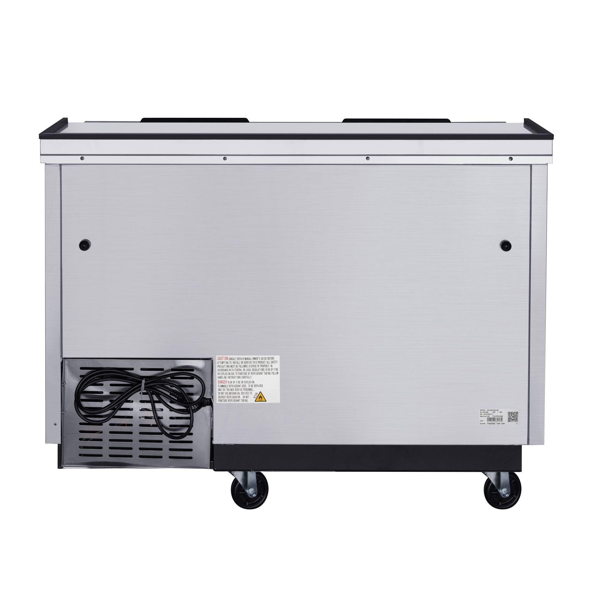 A silver appliance with a white sticker on it. The sticker has a warning sign and a label that says "300V" and "1500W". The appliance is on wheels, making it easy to move around.