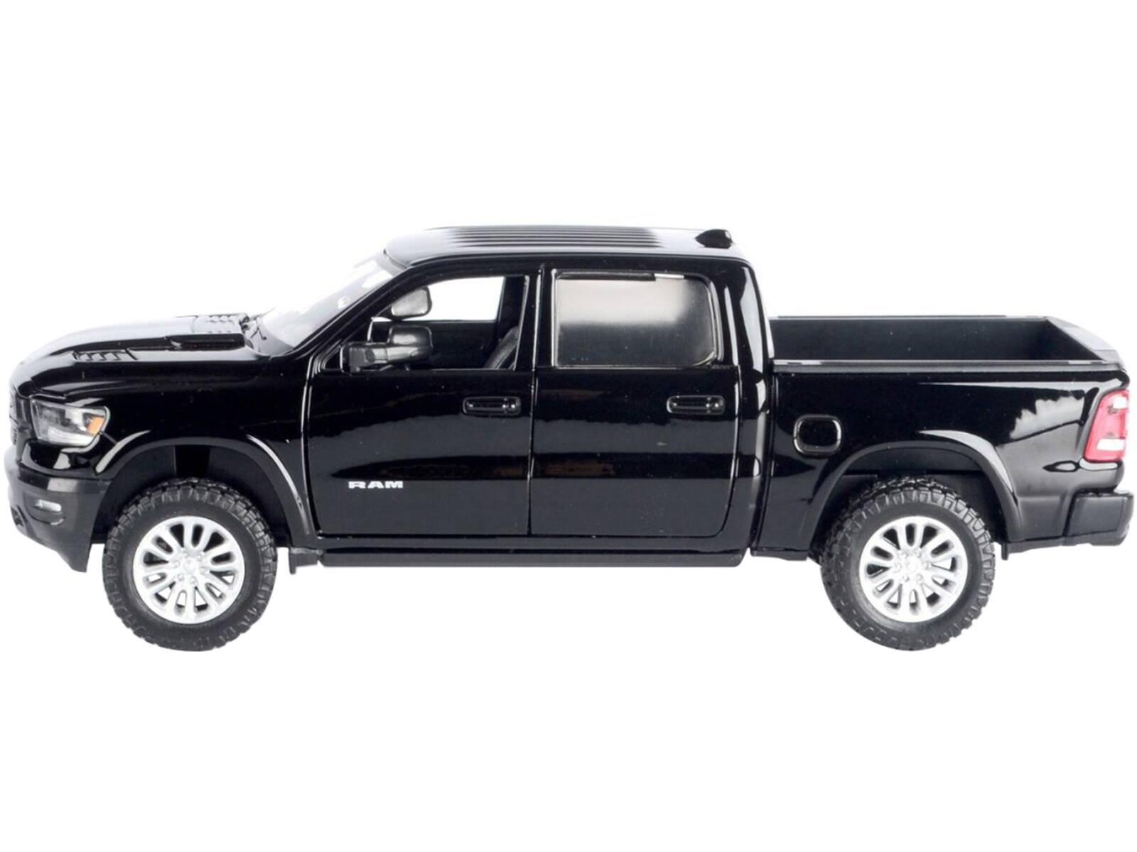 Alt View 3. Motormax - 2019 RAM 1500 Laramie Crew Cab Pickup Truck Black with Silver Stripes 1/24 Diecast Model Car by Motormax.