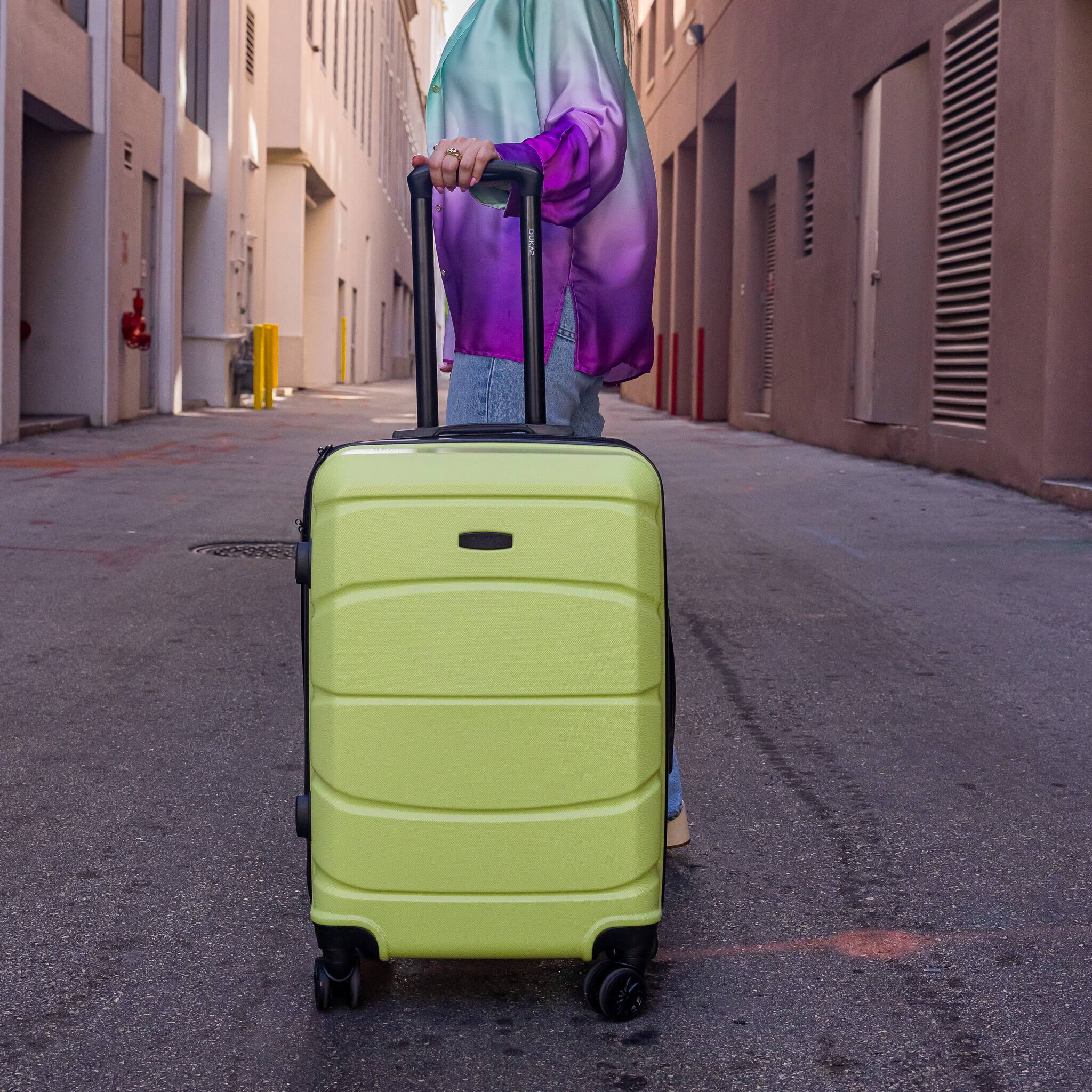 Left. DUKAP - Sense Lightweight Hardside Spinner Luggage 24" - GREEN.