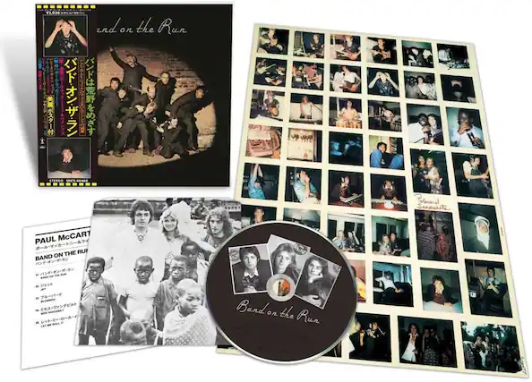 Sure, here is the corrected and grouped text from the image:
---
**Album Cover:**
- Band on the Run
- Paul McCartney & Wings
- STEREO UICY-04068
**Tracklist:**
1. Band on the Run
2. Jet
3. Bluebird
4. Mrs. Vandebilt
5. Let Me Roll It
**Polaroid Snapshots**
**Additional Text:**
- 29345471 12 934
- Polaroid Snapshots
- Paul McCartney & Wings
- Band on the Run
---
This text is organized based on the visible elements in the image.