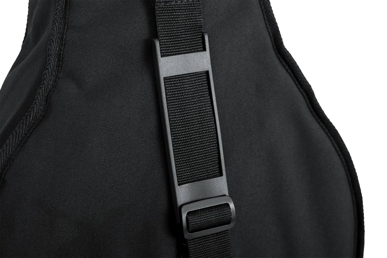 Left. Gator - Economy Gig Bag for Flying V and Explorer Shaped Guitars with 10mm Foam Padding.