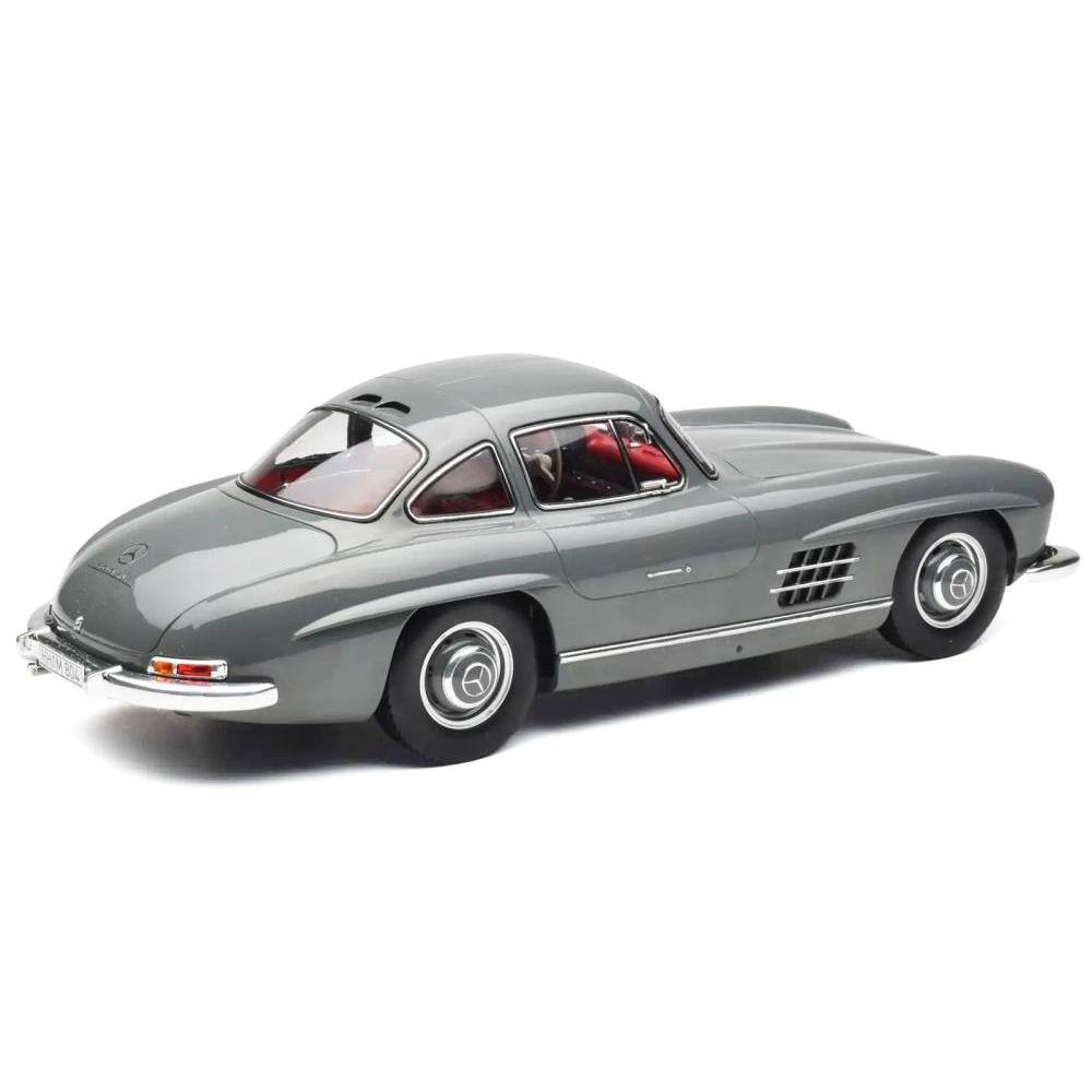 Left. Norev - 1954 Mercedes-Benz 300 SL Graphite Gray with Red Interior Limited Edition to 500 pieces Worldwide 1/12 - Gray and Red.