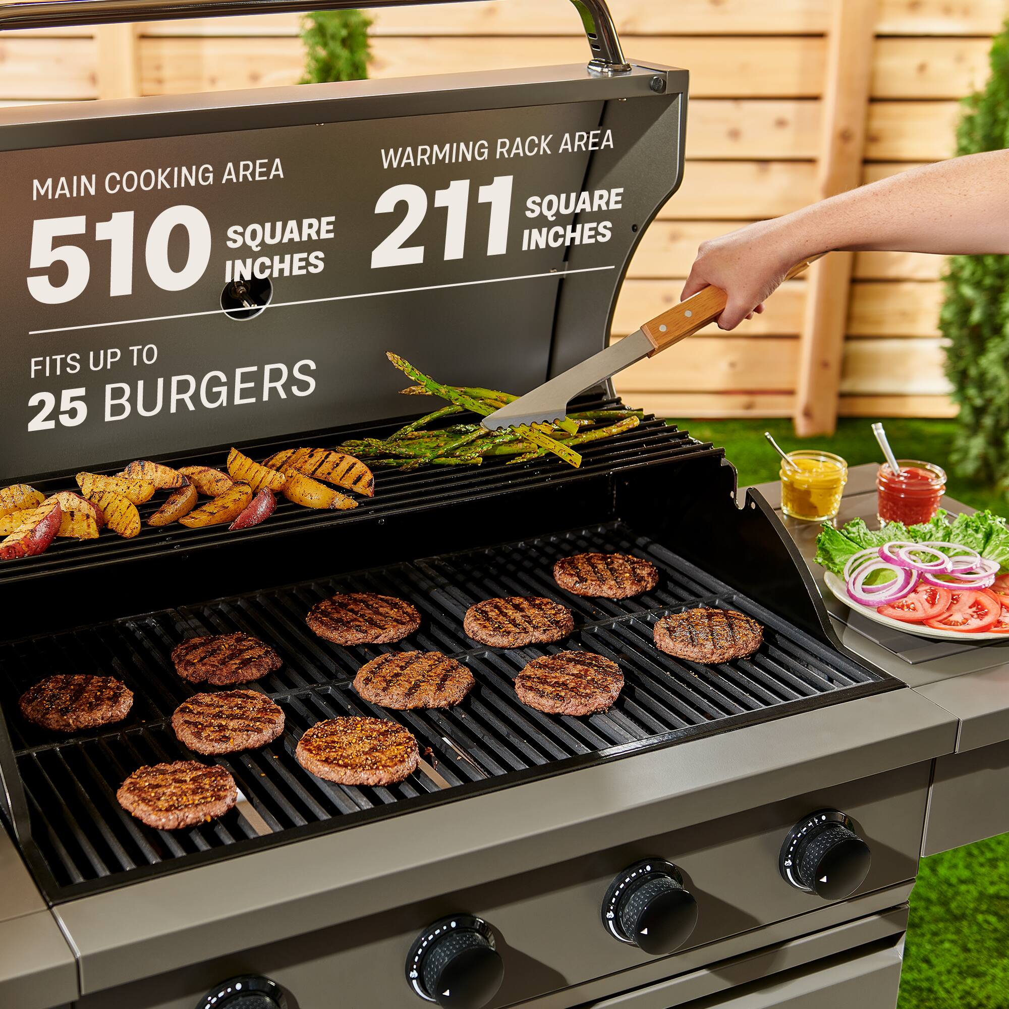 The text on the image reads: "Warming Rack Area Main Cooking Area 510 Square Inches 211 Square Inches Fits up to 25 Burgers."