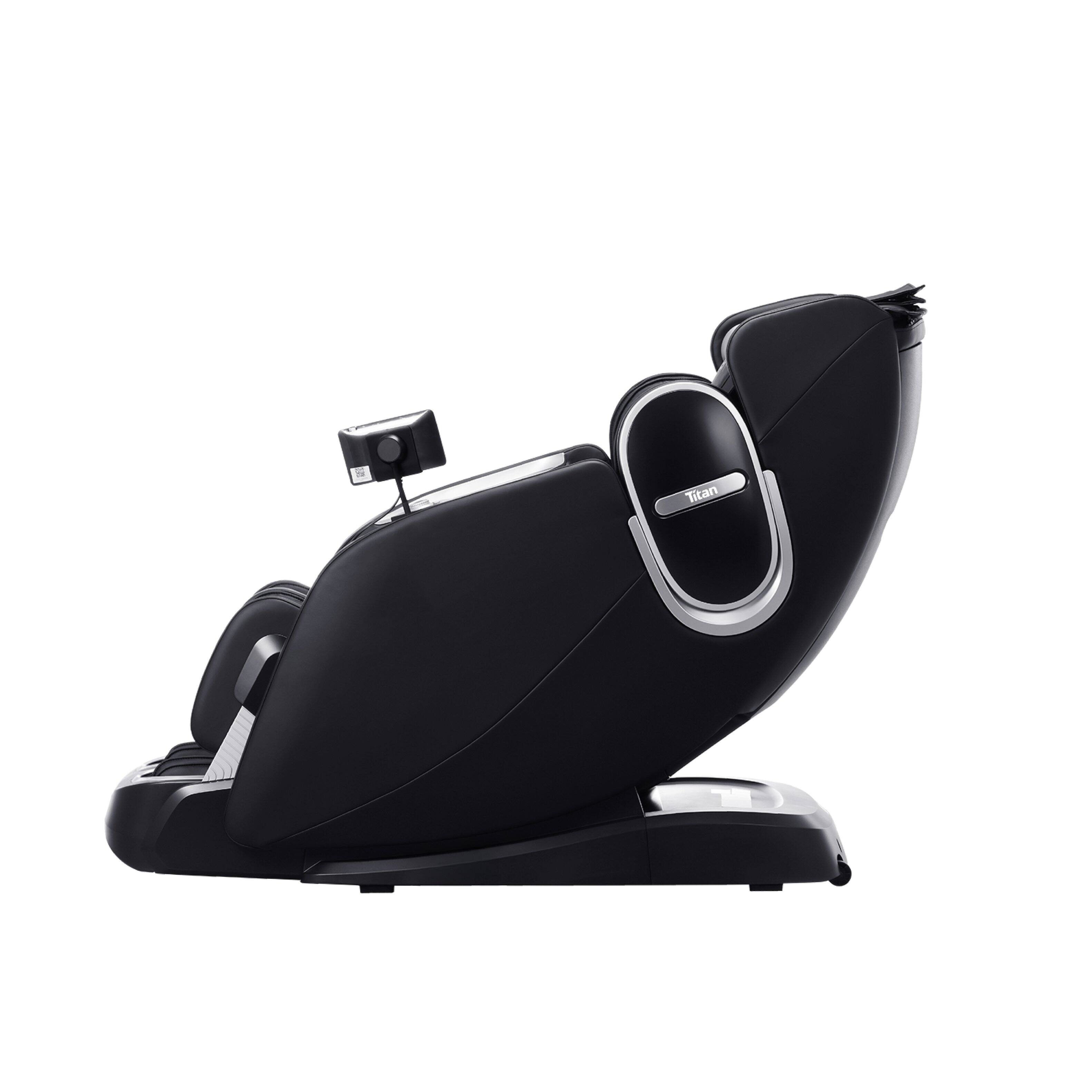 Left. Titan - Pro 4D Aria Zero Gravity Massage Chair with Dual Rail, Dual Heating, Calf Rollers - Black - Black.