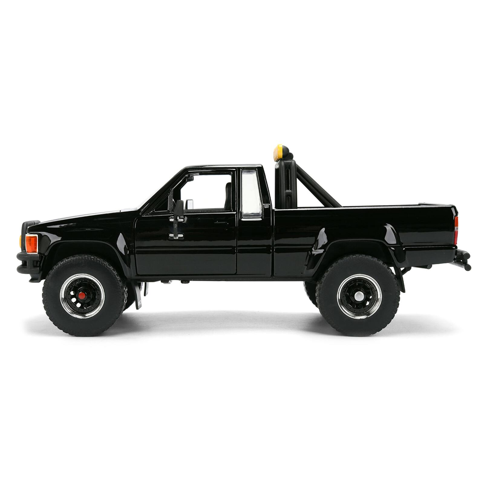 Alt View 3. Jada - 1985 Toyota SR5 Pickup Truck Black with Marty's Skateboard "Back to the Future" (1985) Movie 1/24 Model Car by Jada.