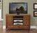 Alt View 1. Simpli Home - Warm Shaker TV Cabinet for Most TVs Up to 52" - Honey Brown.