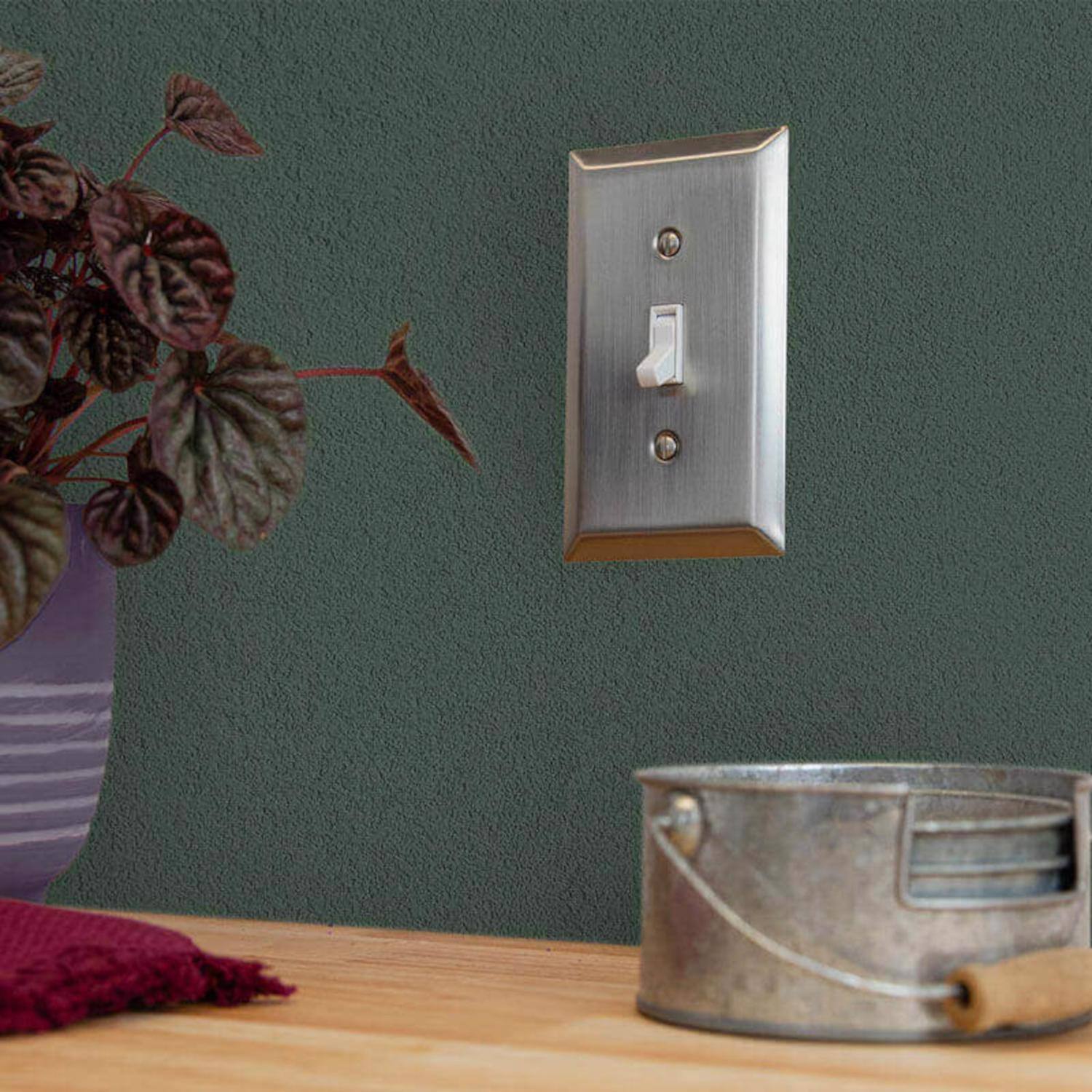 Left. AMERELLE - Amerelle Century Brushed Nickel 3 gang Stamped Steel Toggle Wall Plate 1 pk - Nickel.
