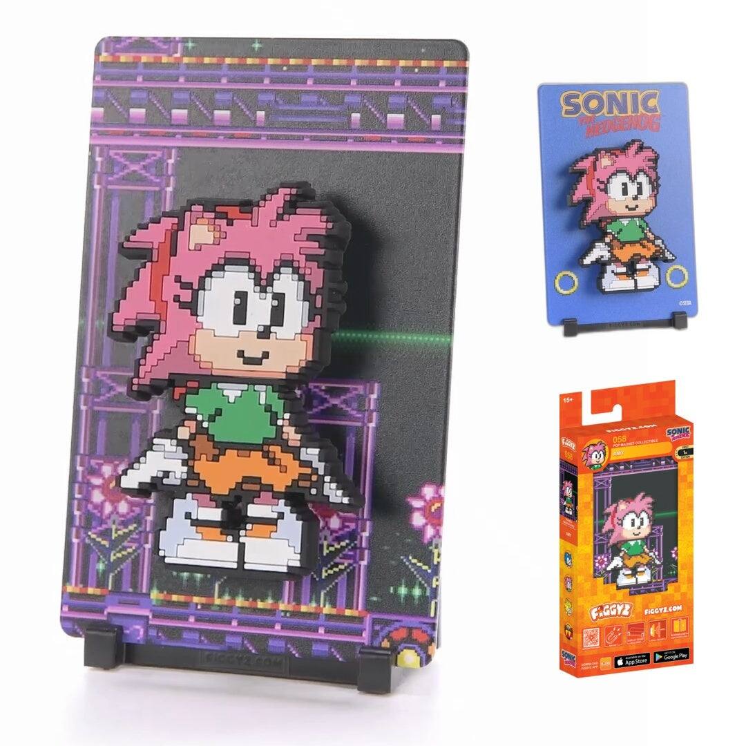 SONIC TOE MEDGENOG  
Lg 0 058 wY SONIC S a FIGGYZ FICGTE.COM COM FICCY2 SOM AppThon APP Cgle

Corrected text:
SONIC THE HEDGEHOG  
Lg 058  
FIGGYZ.COM  
FIGGYZ.COM  
App Store  
Google Play