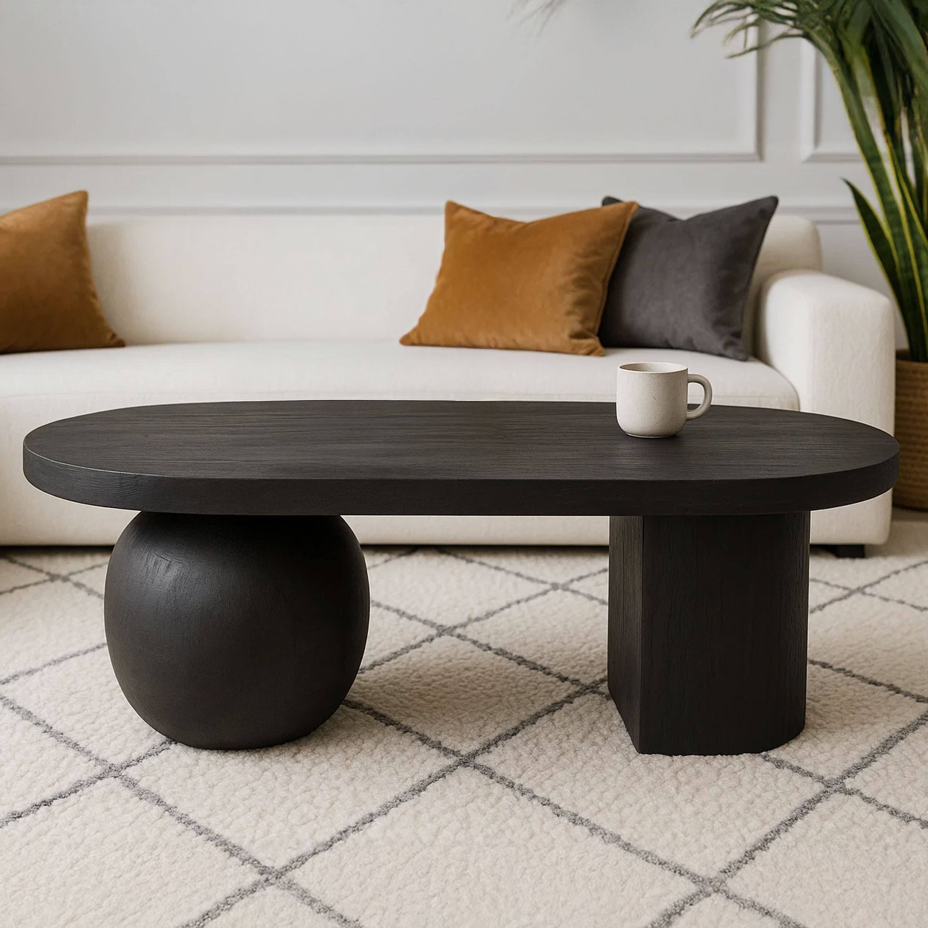Alt View 8. Manhattan Lane - Uri 38 Inch Oval Coffee Table, Mango Wood Full and Half Spherical Leg - Sanblasted Black.