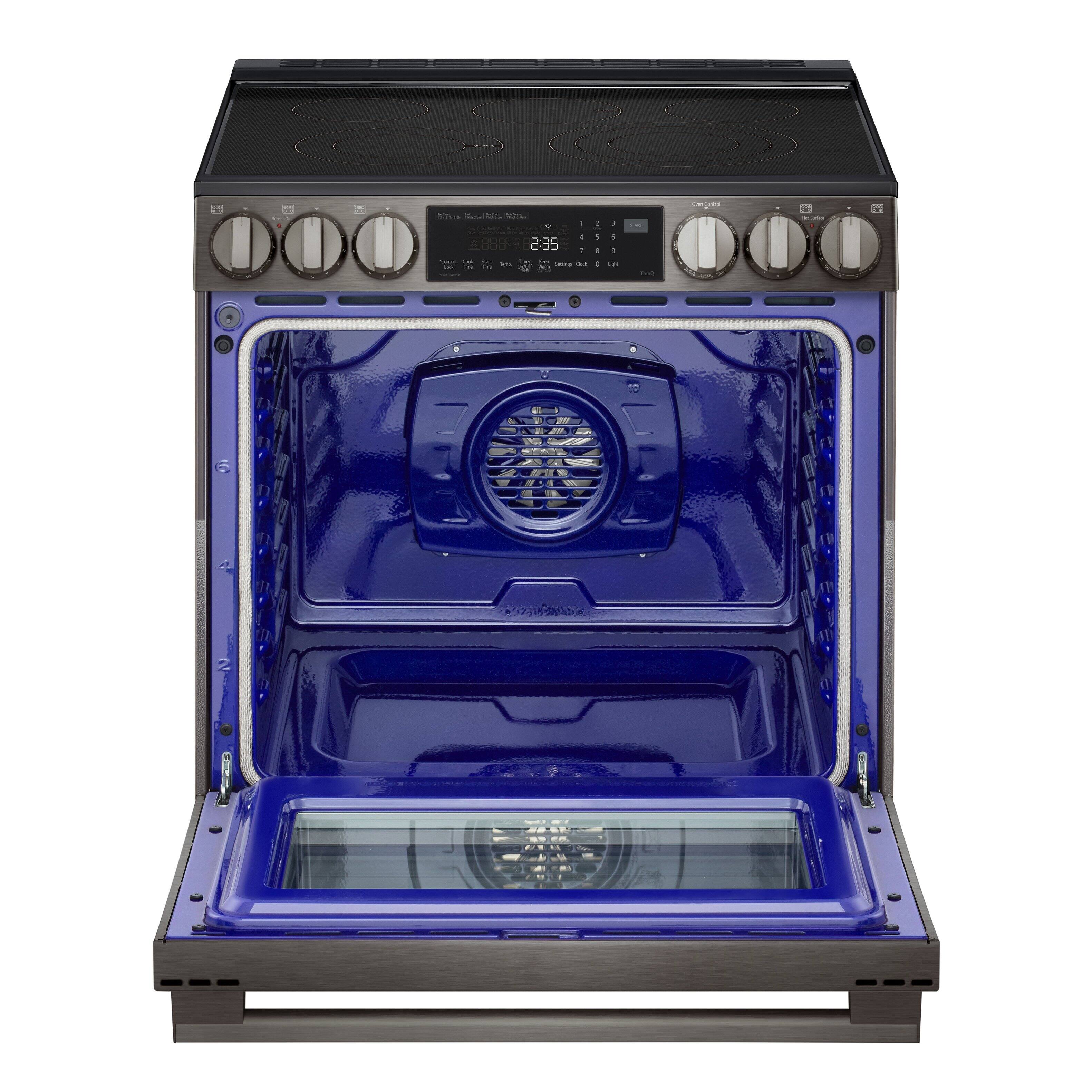 The oven is a blue and silver model with the number 888E on it. The time displayed on the oven is 2:35.