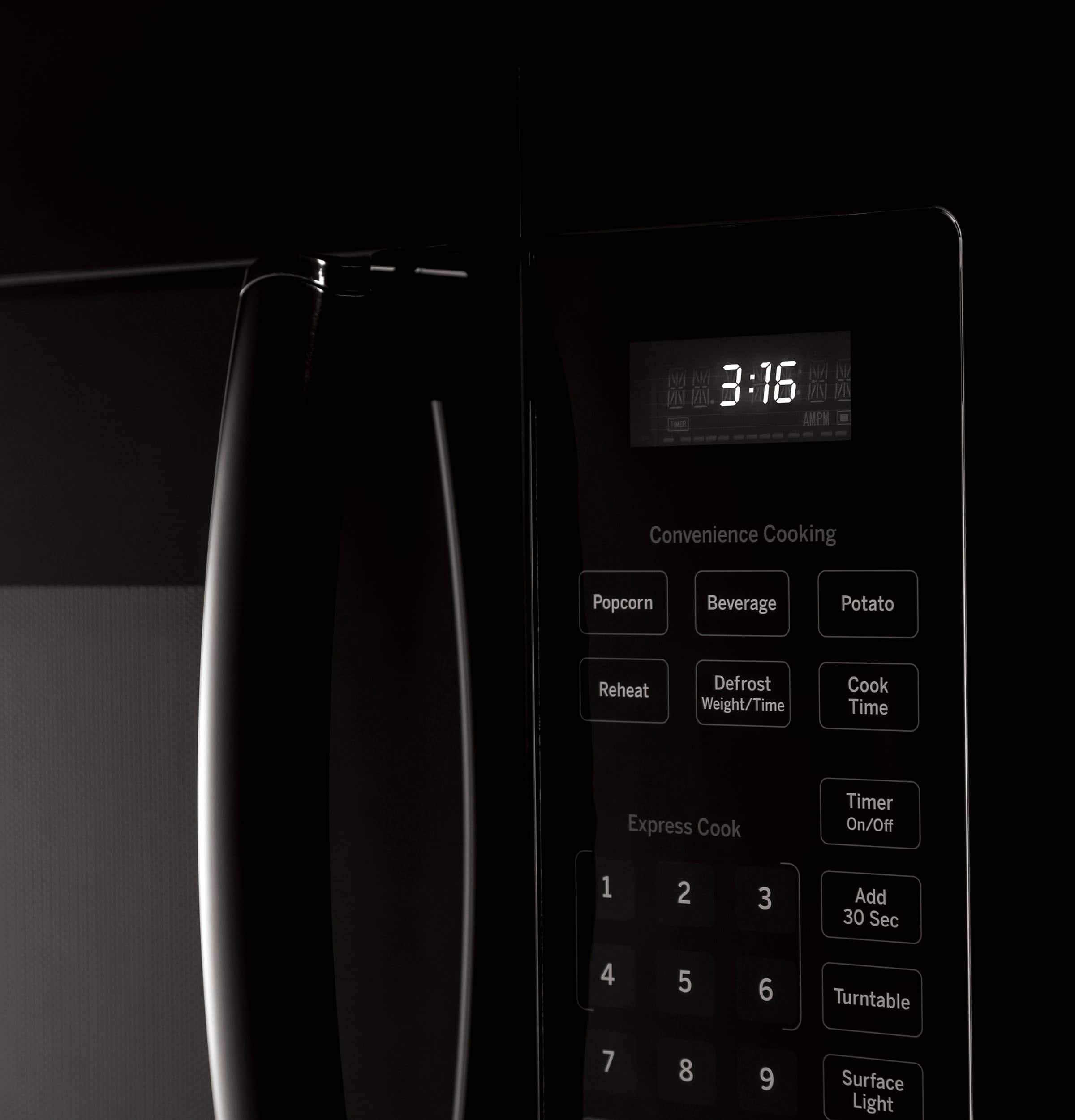 The text on the image reads: "Convenience Cooking Popcorn Beverage Potato Reheat Defrost Weight/Time Cook Time Express Cook Timer On/Off 1 2 3 Add 30 Sec 4 5 6 Turntable 7 8 9 Surface Light." This text is grouped and corrected as follows:
Convenience Cooking:
Popcorn:
Beverage:
Potato:
Reheat:
Defrost:
Weight/Time:
Cook Time:
Express Cook Timer:
On/Off:
1
2
3
Add 30 Sec:
4
5
6
Turntable:
7
8
9
Surface Light: