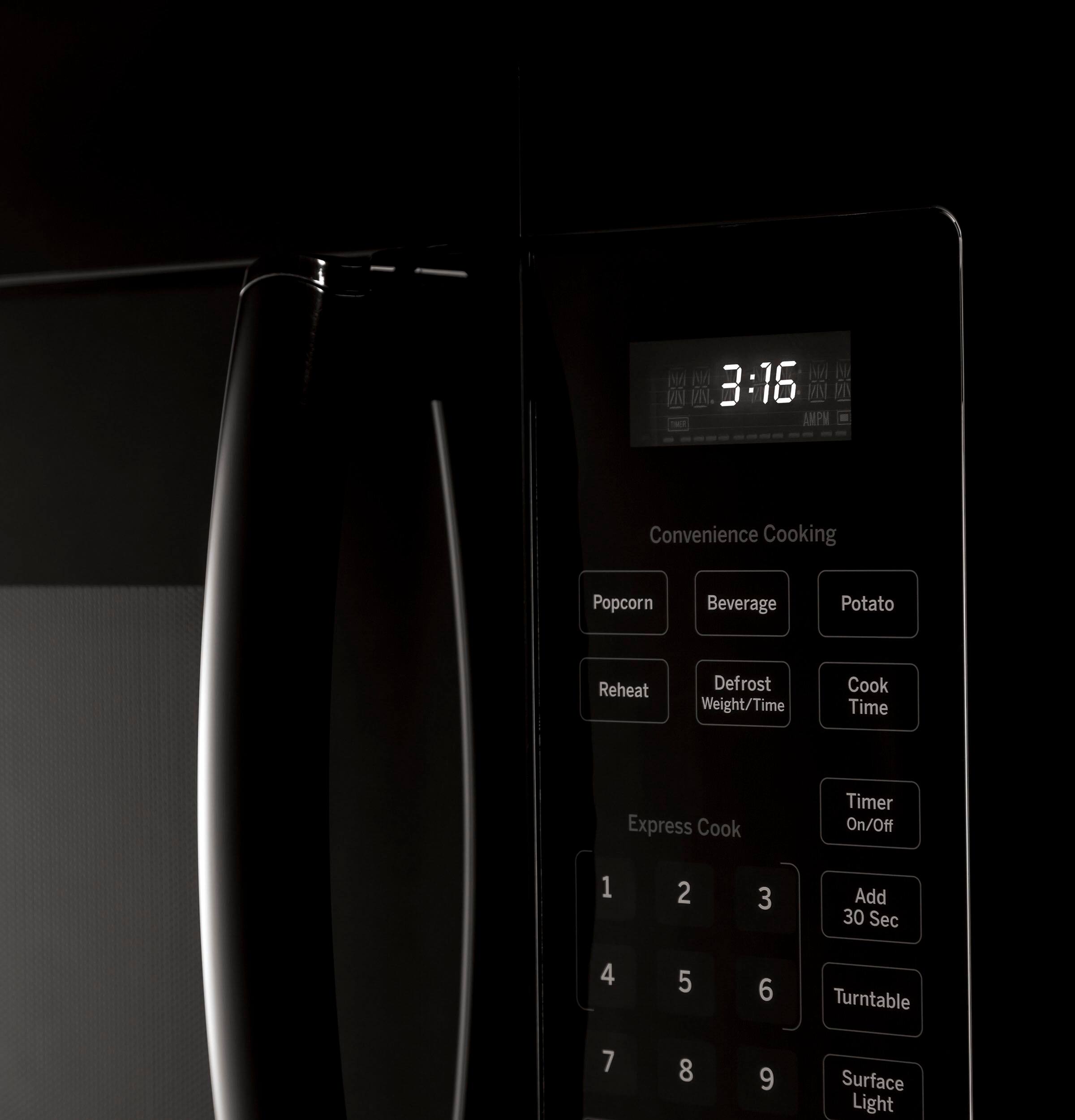 The text on the image reads: "Convenience Cooking Popcorn Beverage Potato Reheat Defrost Weight/Time Cook Time Express Cook Timer On/Off 1 2 3 Add 30 Sec 4 5 6 Turntable 7 8 9 Surface Light." This text is grouped and corrected as follows:

Convenience Cooking:
Popcorn:
Beverage:
Potato:
Reheat:
Defrost:
Weight/Time:
Cook Time:
Express Cook Timer:
On/Off:
1
2
3
Add 30 Sec:
4
5
6
Turntable:
7
8
9
Surface Light: