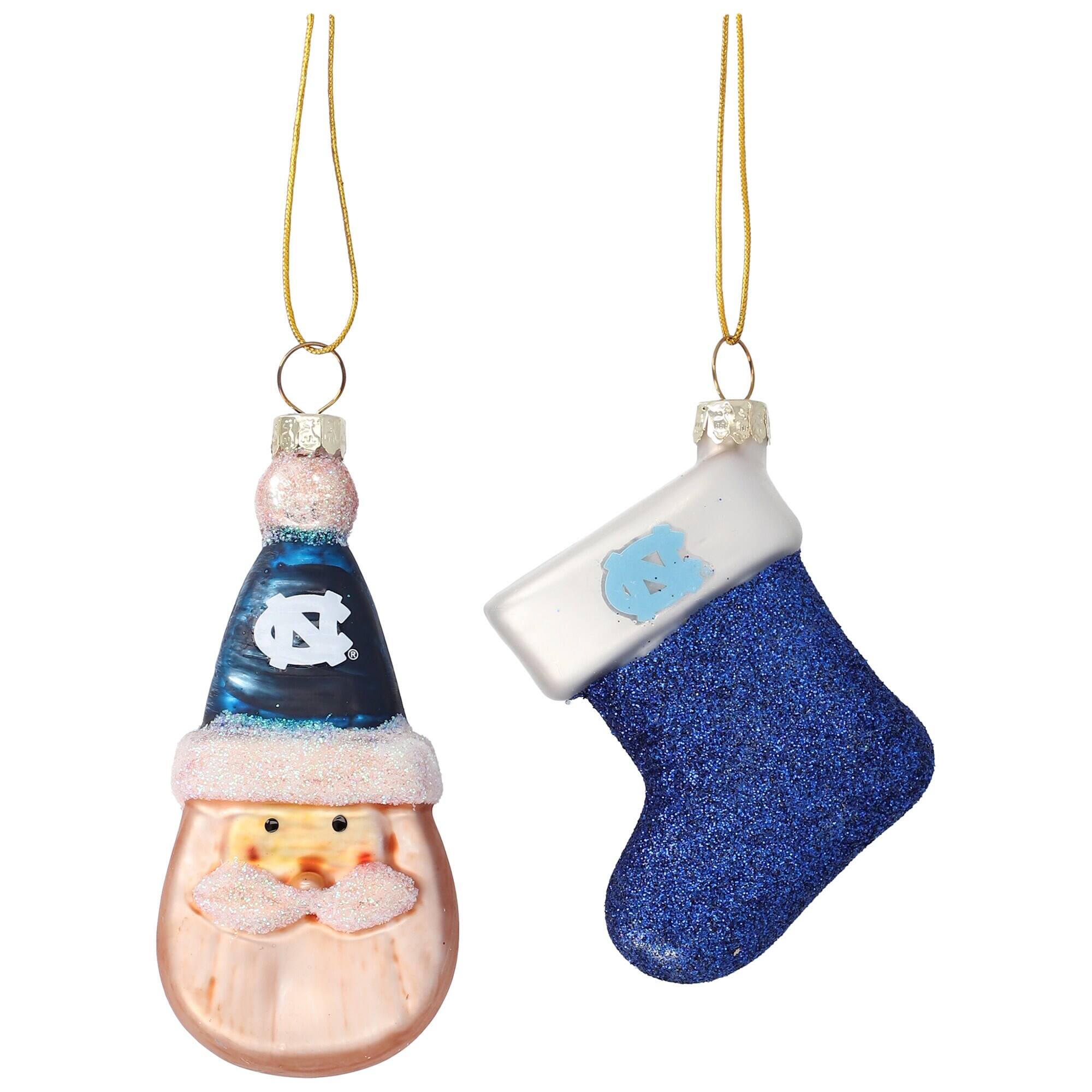 Front. The Memory Company - North Carolina Tar Heels Two-Pack Santa & Stocking Blown Glass Ornament Set - Multicolor.