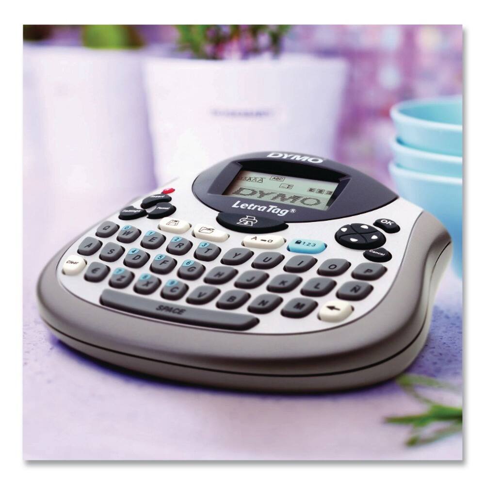 Sure, here is the corrected and grouped text:

- DYMO
- LetraTag
- ABC
- 123
- OK
- SPACE
- A B C
- D E F
- G H I
- J K L
- M N O
- P Q R
- S T U
- V W X
- Y Z
- 0
- 1 2 3
- 4 5 6
- 7 8 9
- . /