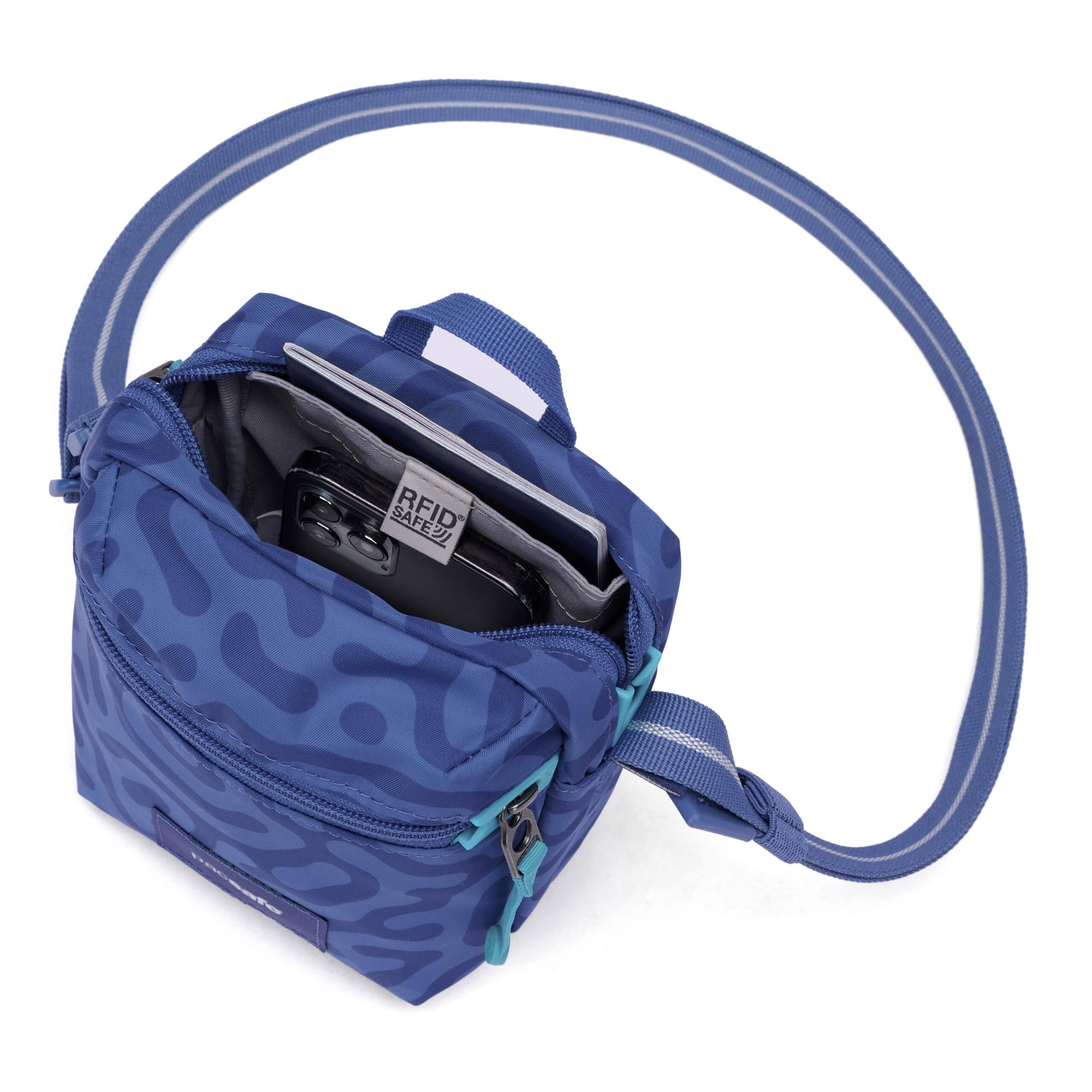 Alt View 1. Pacsafe - GO Micro Crossbody - Cerulean Blue.