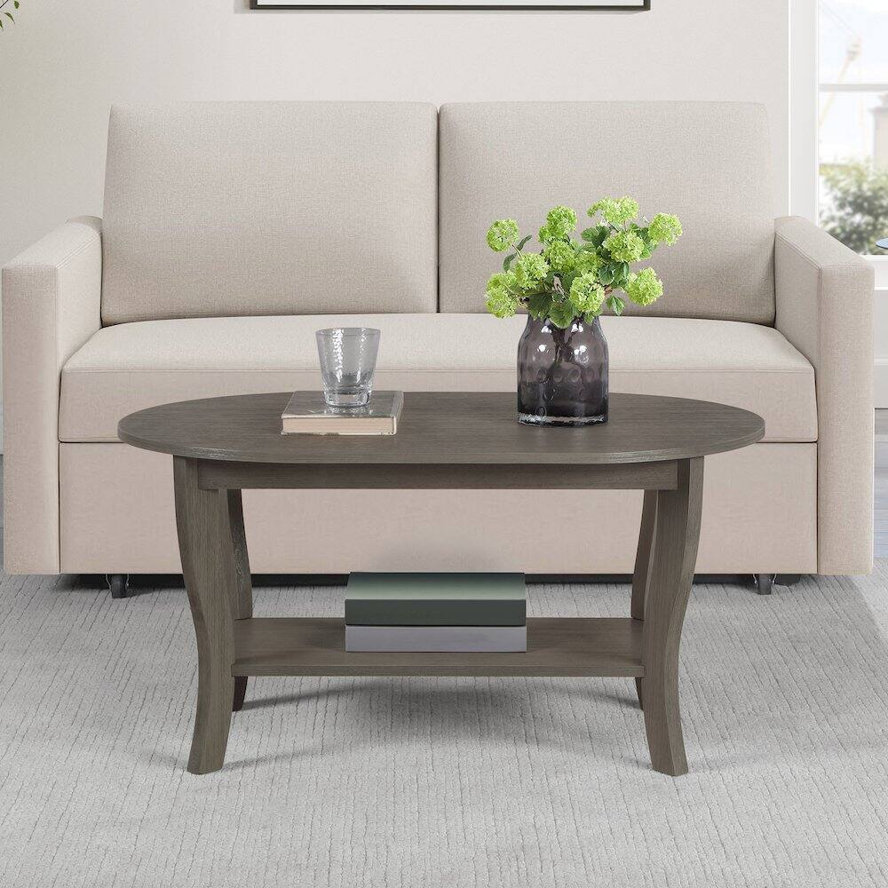 Angle. Convenience Concepts - American Heritage Oval Coffee Table with Shelf - Wirebrush Dark Gray.