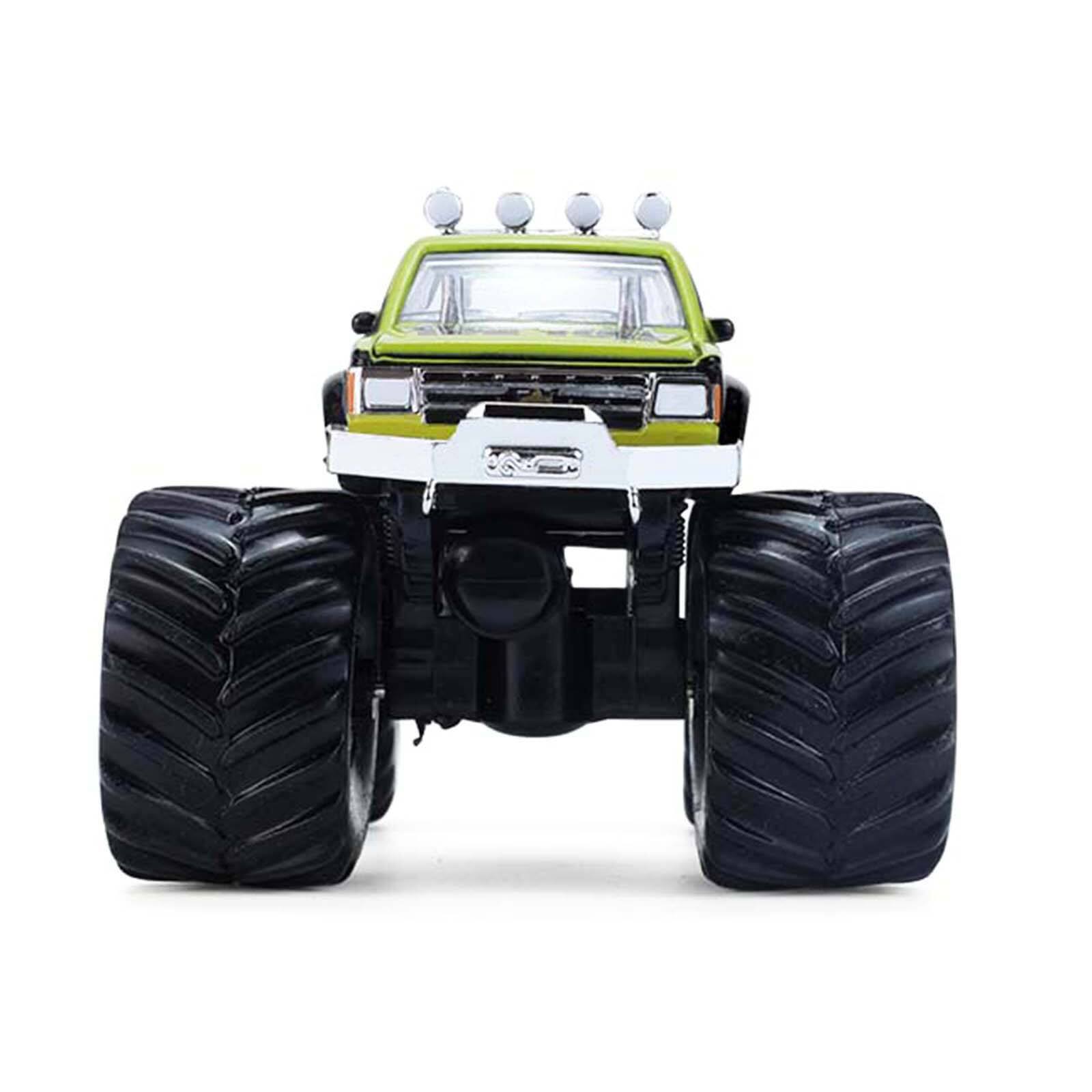 Alt View 3. Greenlight - 1986 Chevrolet S10 Monster Truck #24 "Raptor" Black and Green with Graphics 1/64 Diecast Model Car by Greenlight.
