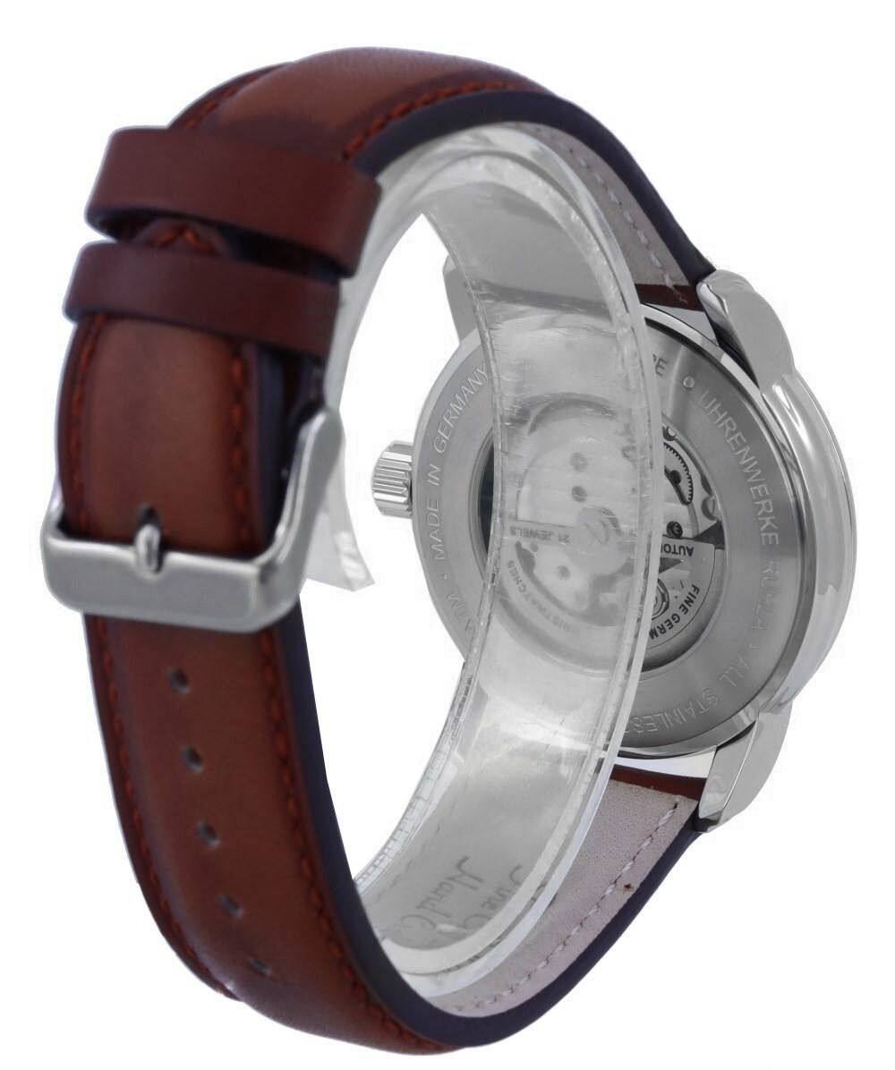 GERMANY IN MADE STAR CHES NTM 1 ELO E O AUTO UHRENWERKE a GERM FINE I ALL STAINLESS Handl

Corrected and grouped text:
- GERMANY IN MADE
- STAR CHES
- NTM 1
- ELO E O
- AUTO UHRENWERKE
- GERM FINE
- ALL STAINLESS
- Handl