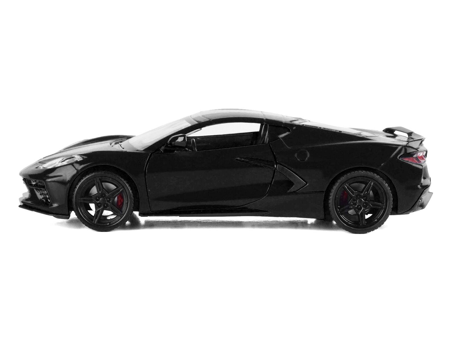 Angle. Motormax - 2020 Chevrolet Corvette C8 Stingray Black with Silver Stripes "Timeless Legends" Series 1/24 - Black, Silver.