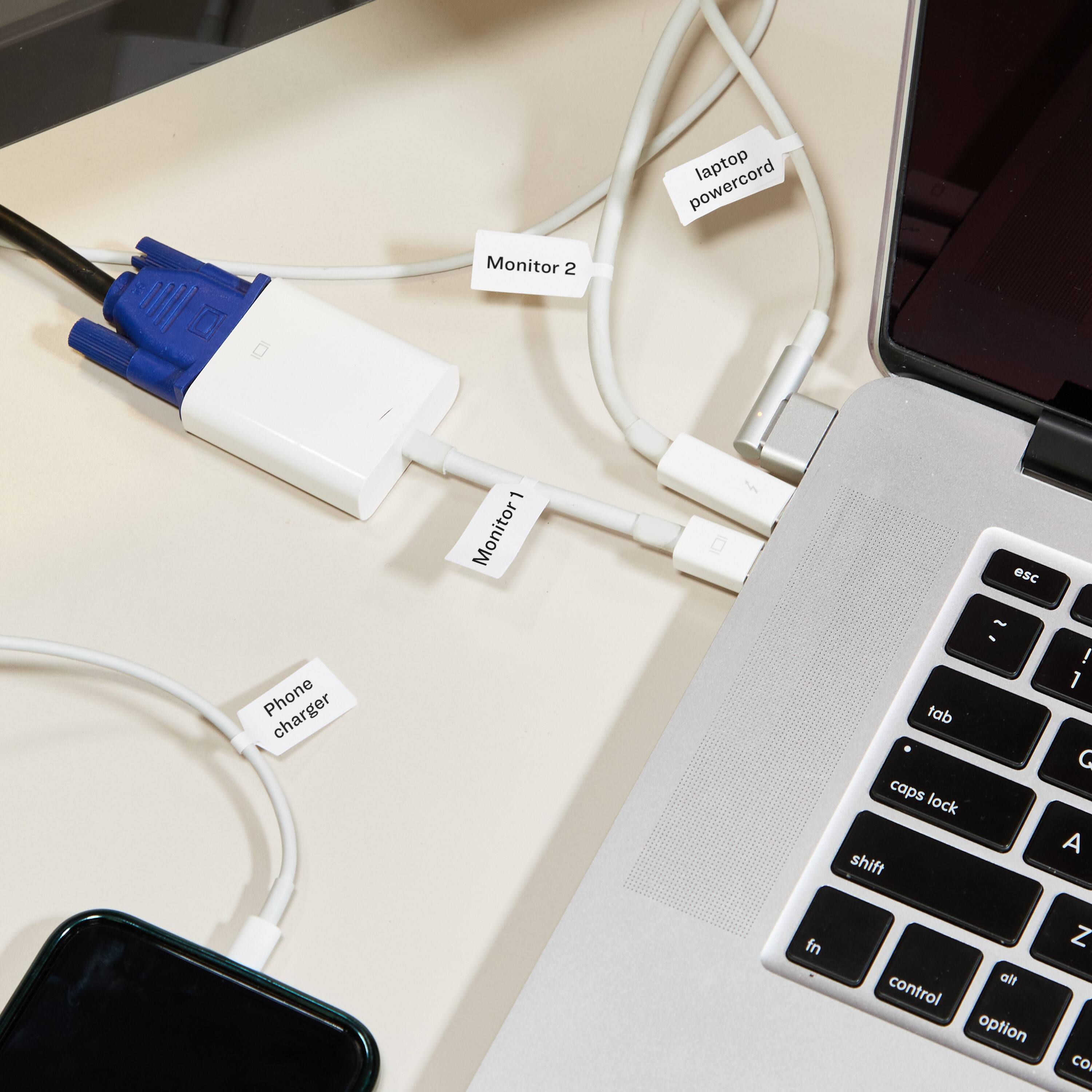 laptop powercord  
Monitor 2  
Monitor 1  
Phone charger  
esc  
!  
1  
tab  
caps lock  
shift  
G  
A  
fn  
alt  
control  
option  
Z
