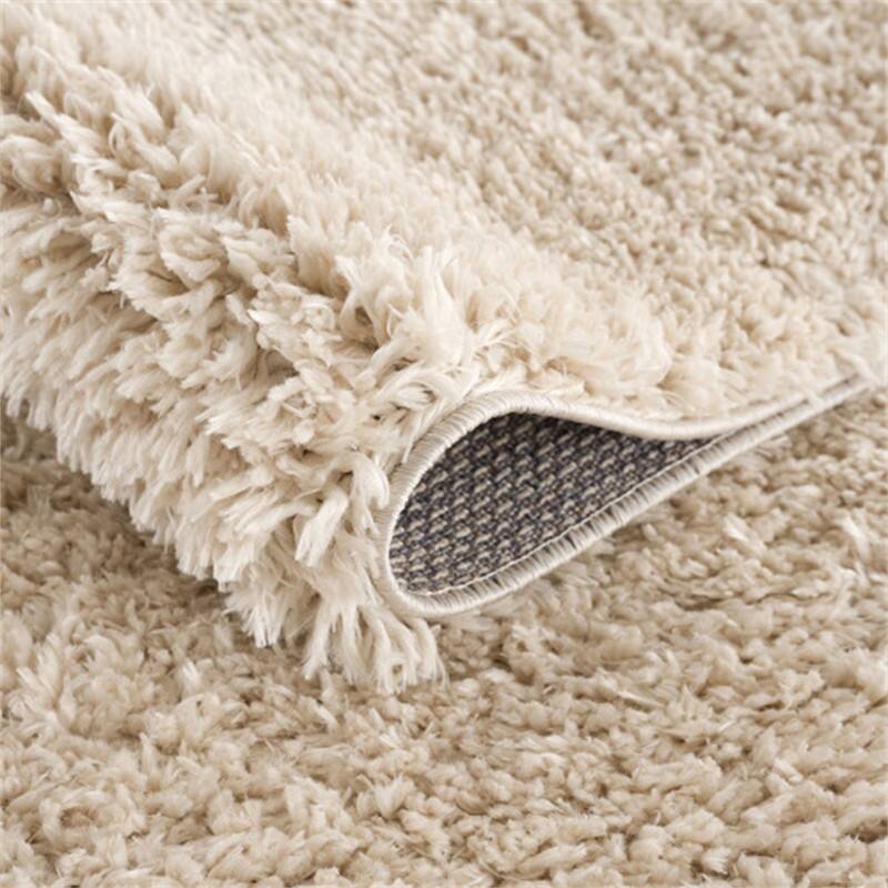 Left. HTUTWOO - Polyester Shag Area Rug - Cream 5x7, Machine Woven Plush Rug, High Pile 0.75", Soft Pile for High-Traffic Areas - Cream.