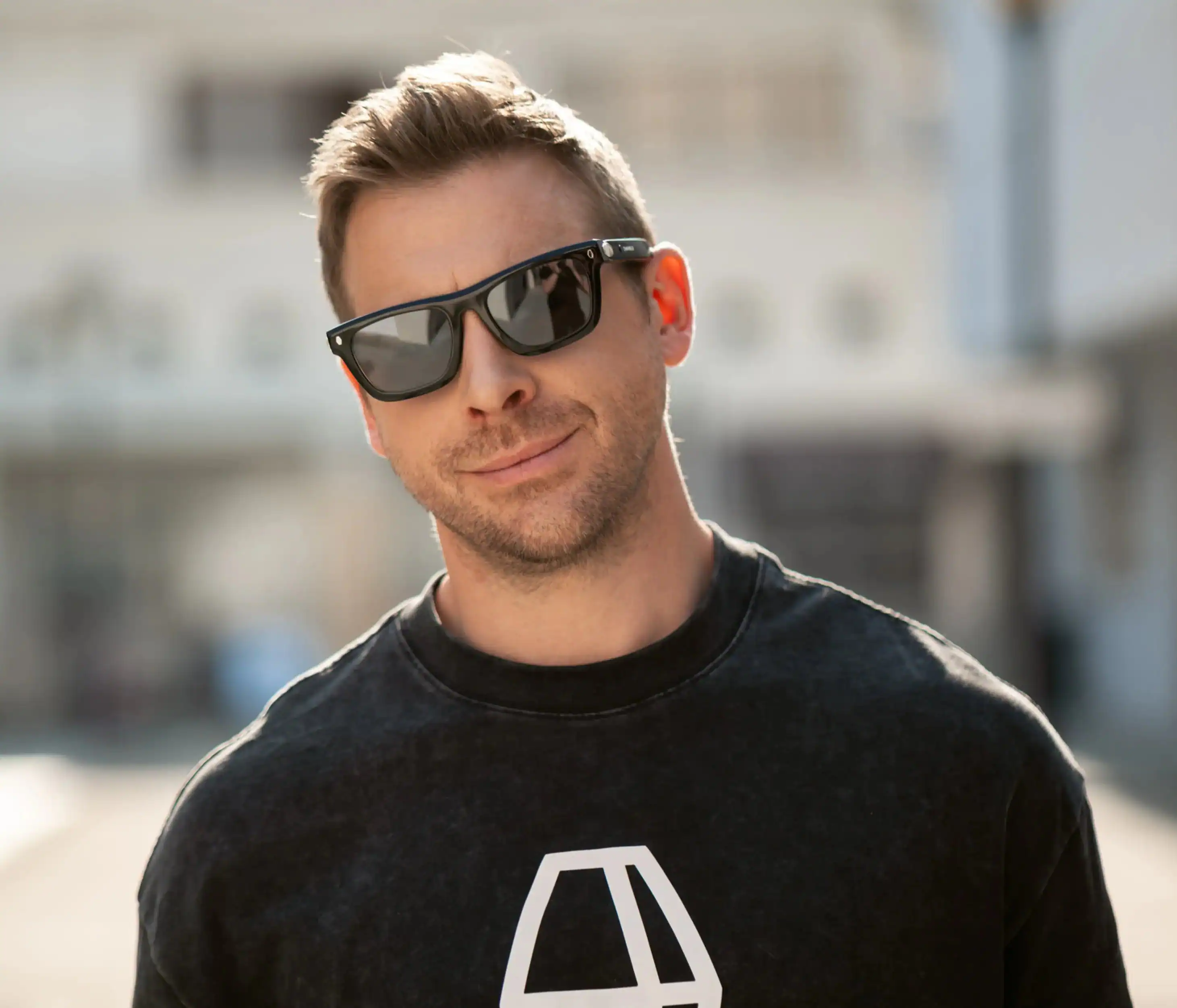 Alt View 1. Chamelo - Lion City Audio Sunglasses with Instant Adjustable Tint - Glossy Black.