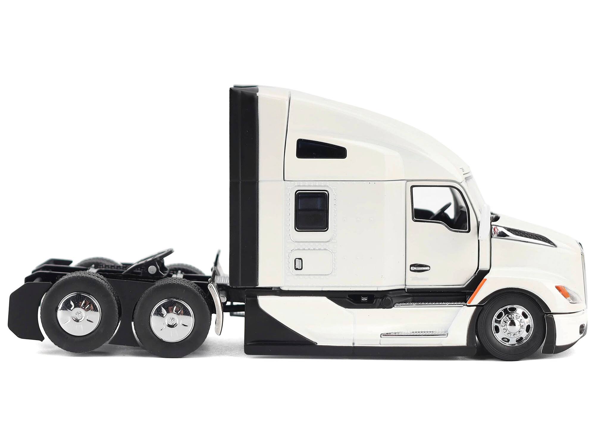 Left. Diecast Masters - Kenworth T680 Truck Tractor Pearl White "Transport Series" 1/50 Diecast Model by Diecast Masters - White.