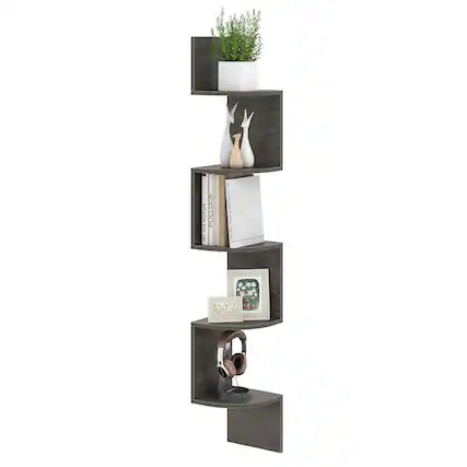 The image features a tall wooden bookshelf filled with various items. On the shelves, there are several books, a potted plant, and a pair of headphones. Additionally, there are two pairs of scissors placed on the shelves. The bookshelf is a multi-purpose storage unit that can be used for holding books, plants, and other items.