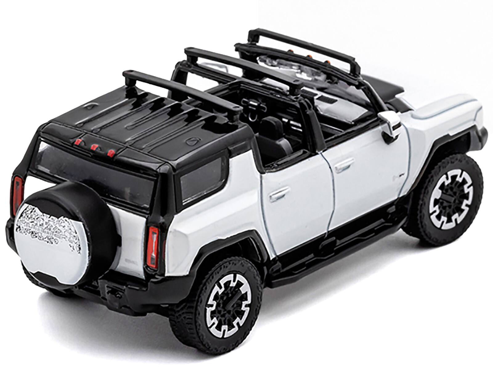 Angle. GCD - 2023 GMC Hummer EV SUV White with Black Top 1/64 Diecast Model Car by GCD - White and Black.