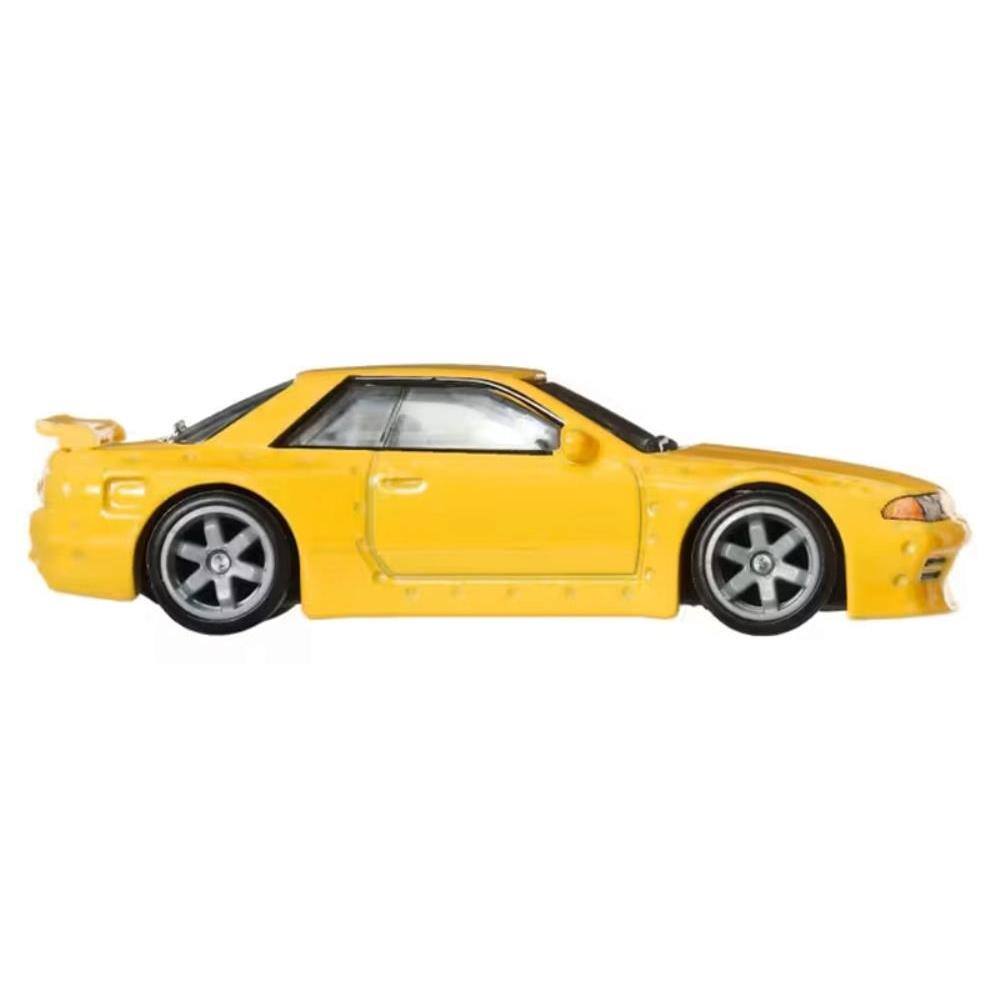 Angle. Hot Wheels - Nissan Skyline GT-R (R32) Pandem RHD (Right Hand Drive) Yellow "Ronin Run II" Series Diecast Model Car by Hot Wheels - Yellow.