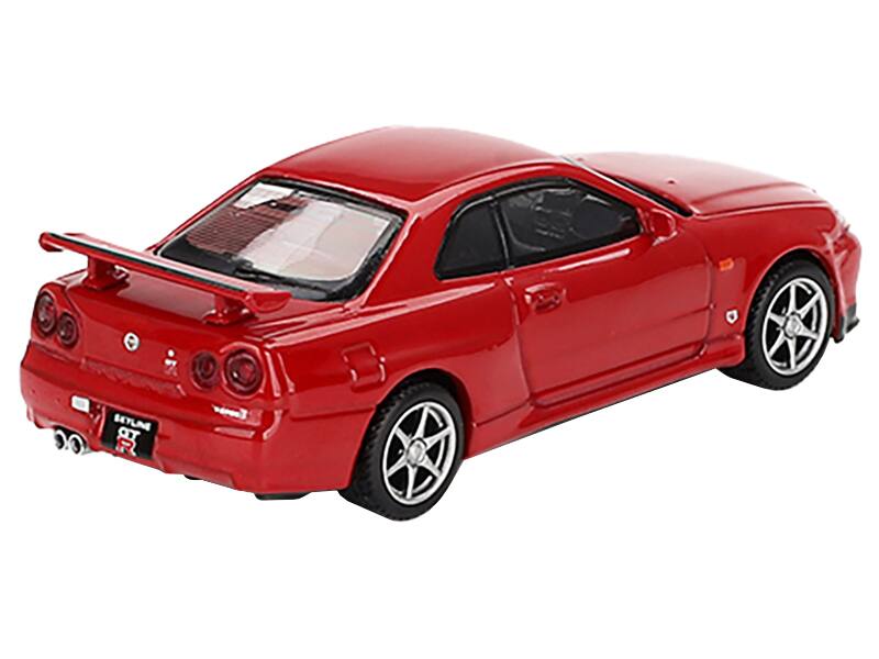 Left. Mini GT - Nissan Skyline GT-R (R34) V-Spec RHD (Right Hand Drive) Active Red Limited Edition 1/64 Diecast Model Car by Mini GT - Red.