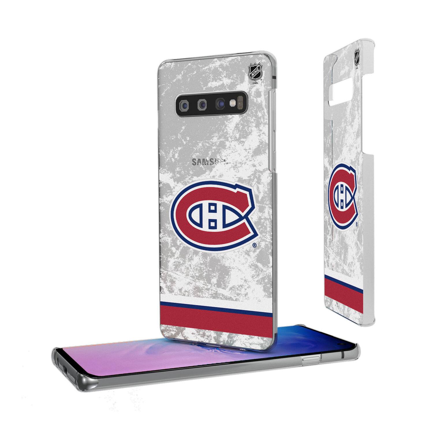 The text on the image is:

- "SAMSUNG" (on the phone case)
- "NHL" (on the phone case, near the top)
- The Montreal Canadiens logo (on the phone case and stand)