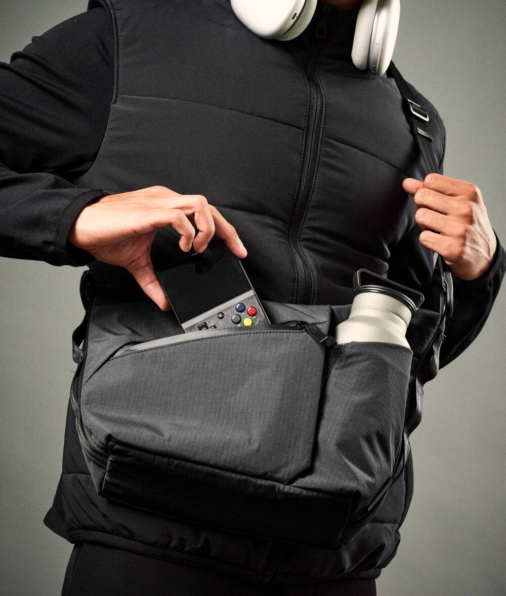 Left. ALPAKA - Flow Satchel 4L Crossbody Bag, Water Resistant Shoulder Bag, Expandable Bottle Pocket, YKK Zippers - Black Axoflux 210D.