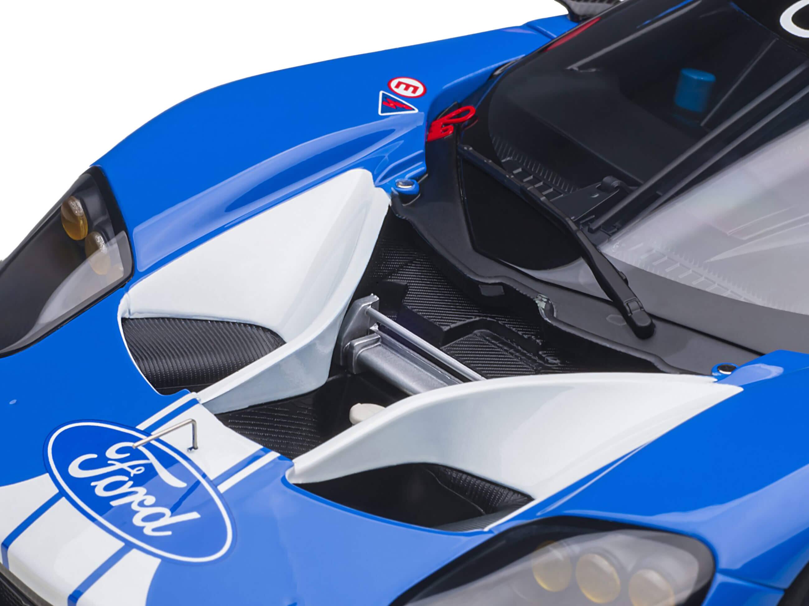 Left. Autoart - Ford GT #68 Sebastien Bourdais - Joey Hand - Dirk Muller 24H of Le Mans (2019) 1/18 Model Car by Autoart - Blue And Red And White.