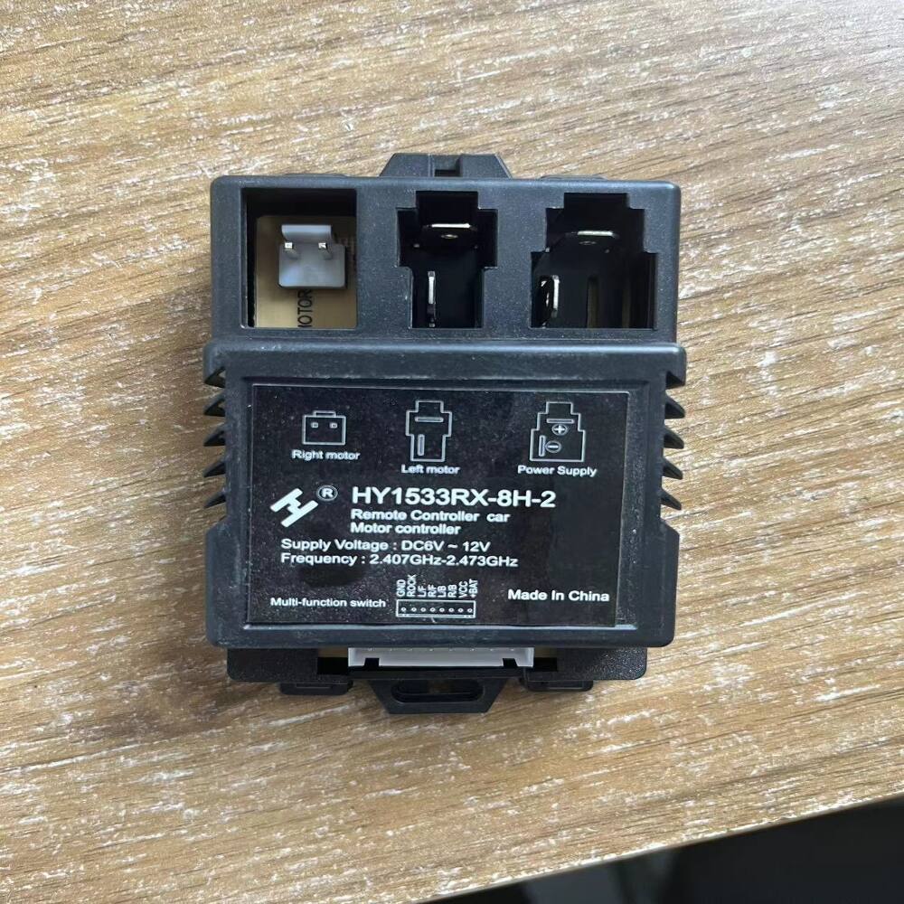 OTOR  
+  
Right motor  
Left motor  
Power Supply  
R HY1533RX-8H-2  
Remote Controller car  
Motor controller  
Supply Voltage : DC6V~12V  
Frequency 2.407GHz-2.473GHz  
Made In China  
Multi-function switch