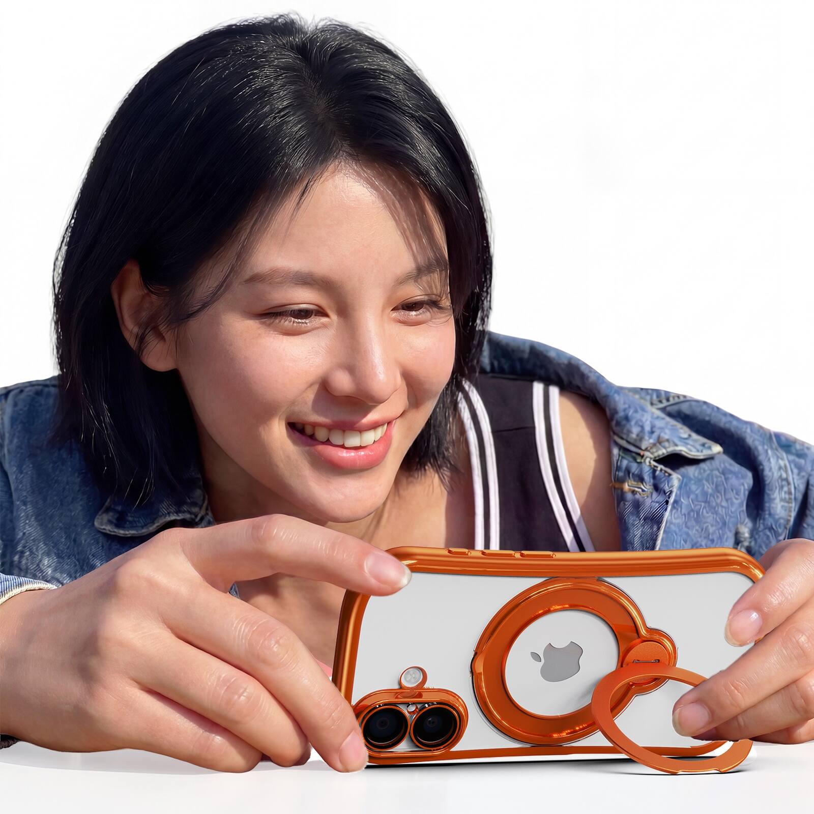 Angle. Dteck - Magnetic Case for Apple iPhone 17 with 360 Ring Stand and Strap, Shockproof TPU Protective Cover Built-in Lens Protector - Orange.