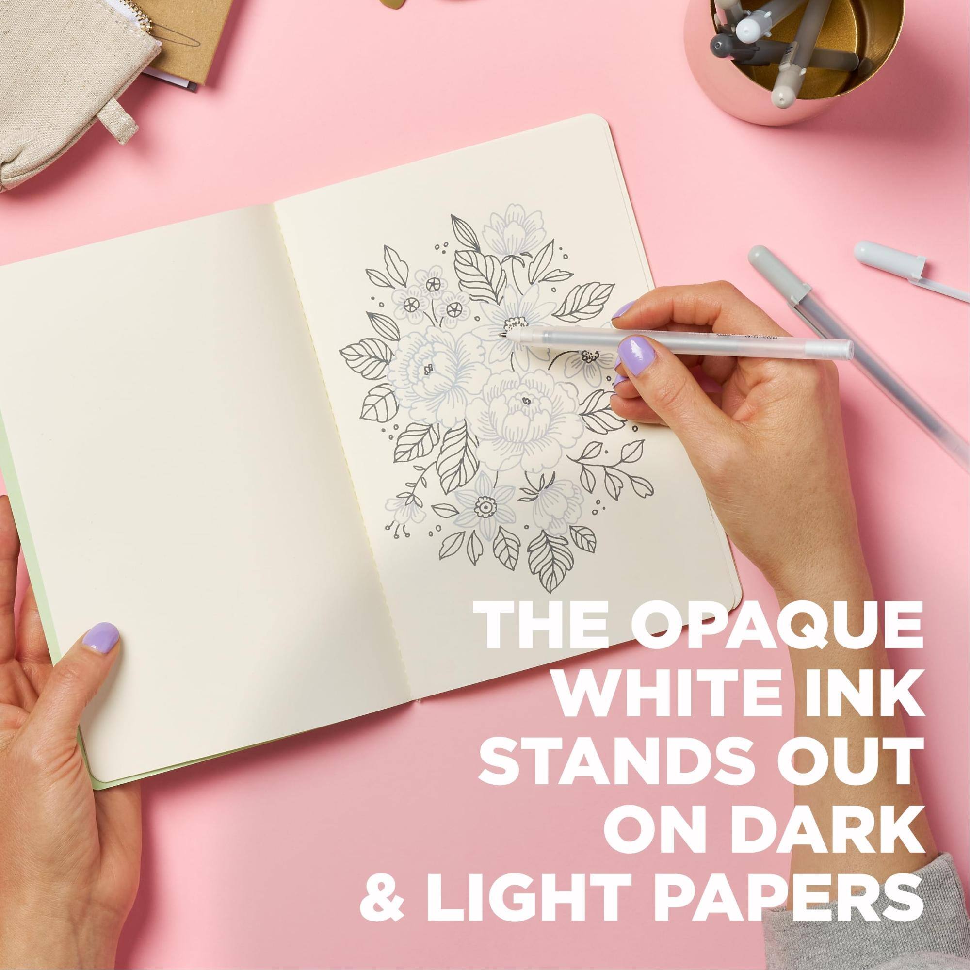 The opaque white ink stands out on dark & light papers