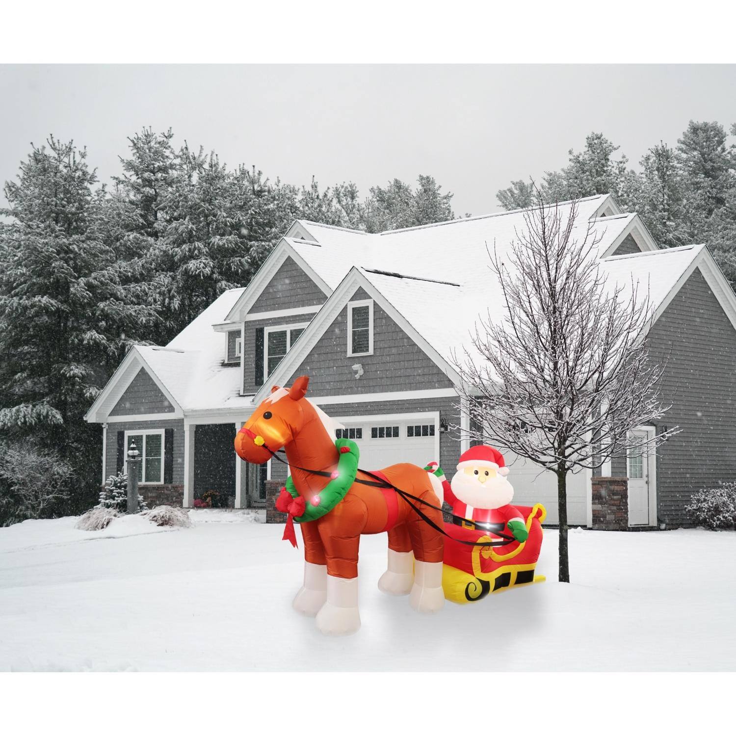 Left. Celebrations - Celebrations Santa with Horse Carriage 9 ft. Inflatable - Multicolored.