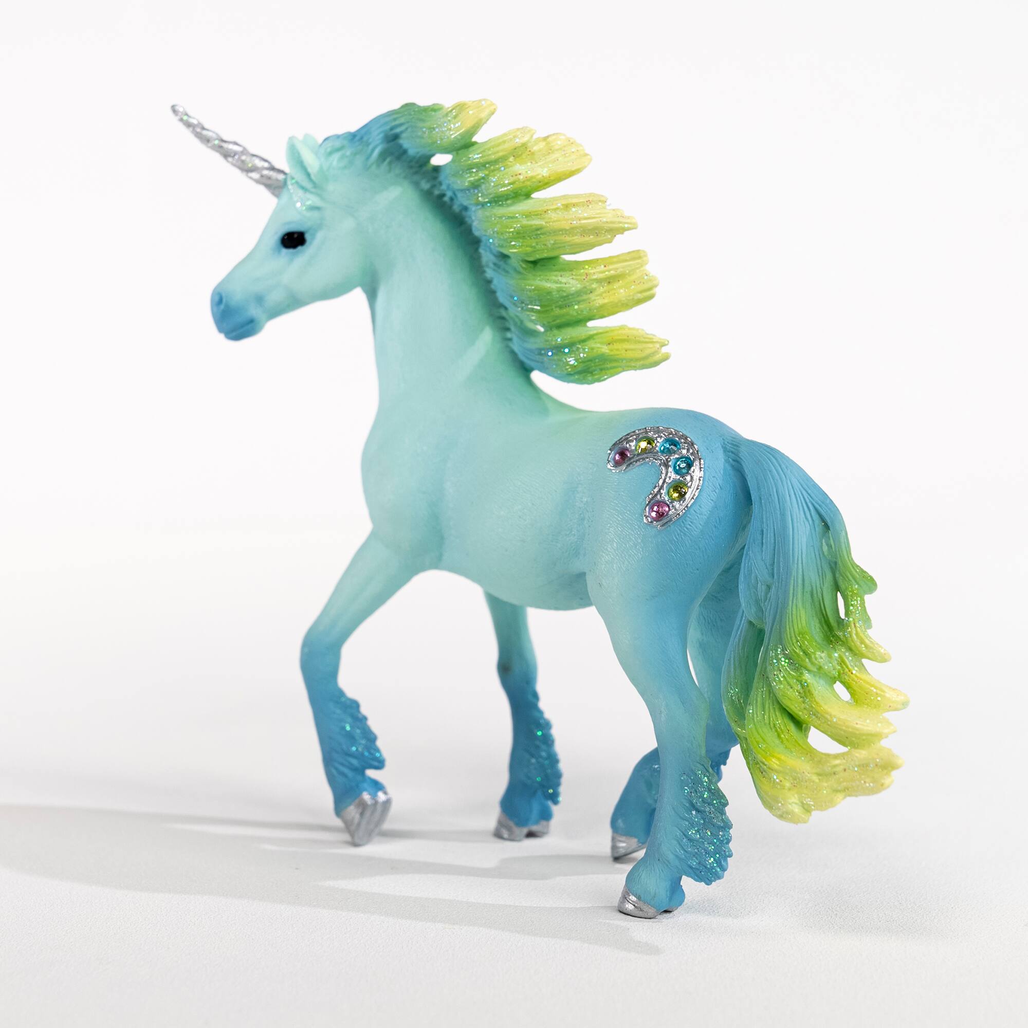 Left. Schleich - Bayala: Marshmallow Unicorn Stallion.