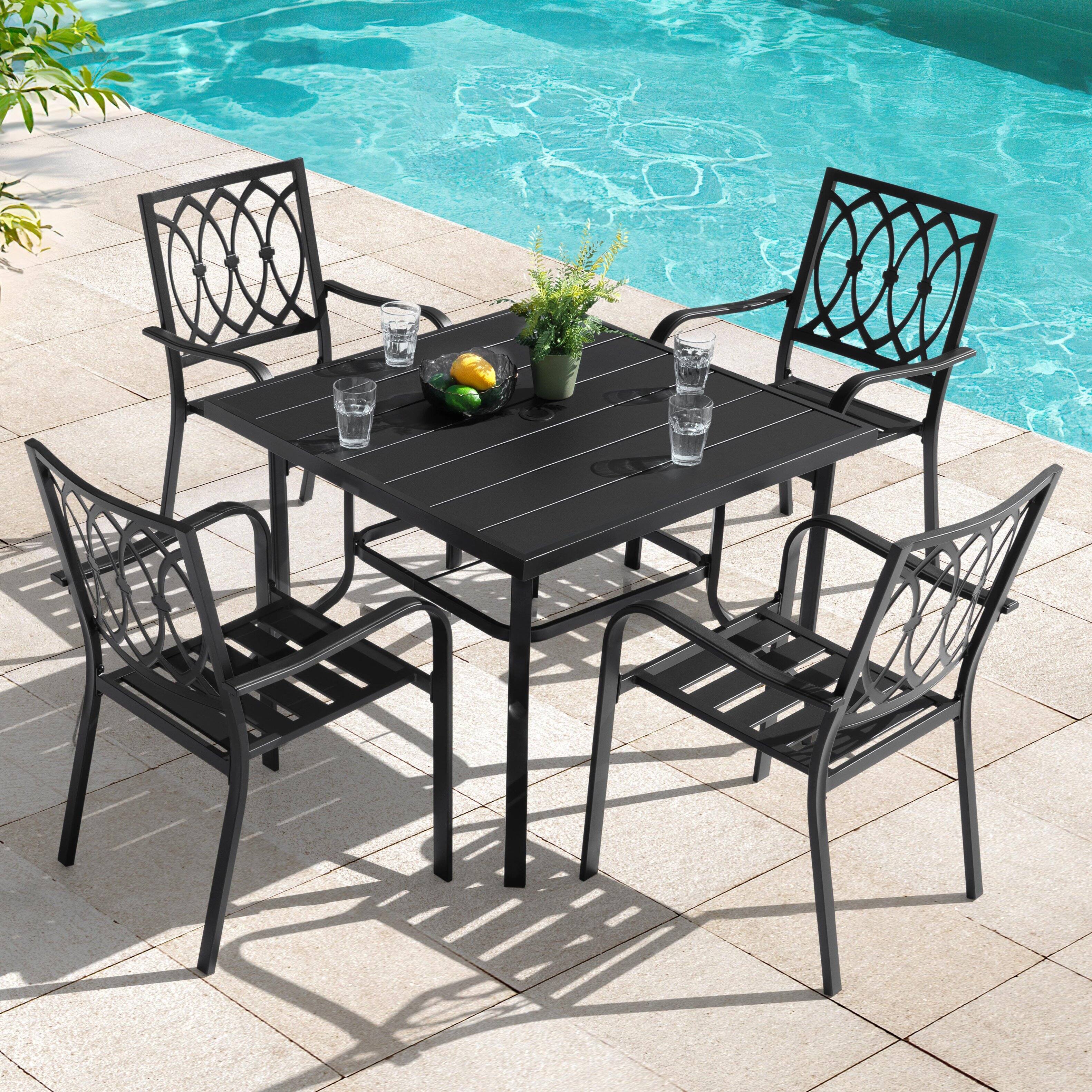 Left. Nuu Garden - 5-Piece Metal Outdoor Dining Set with Umbrella Hole, 4 Stackable Chairs - Black.