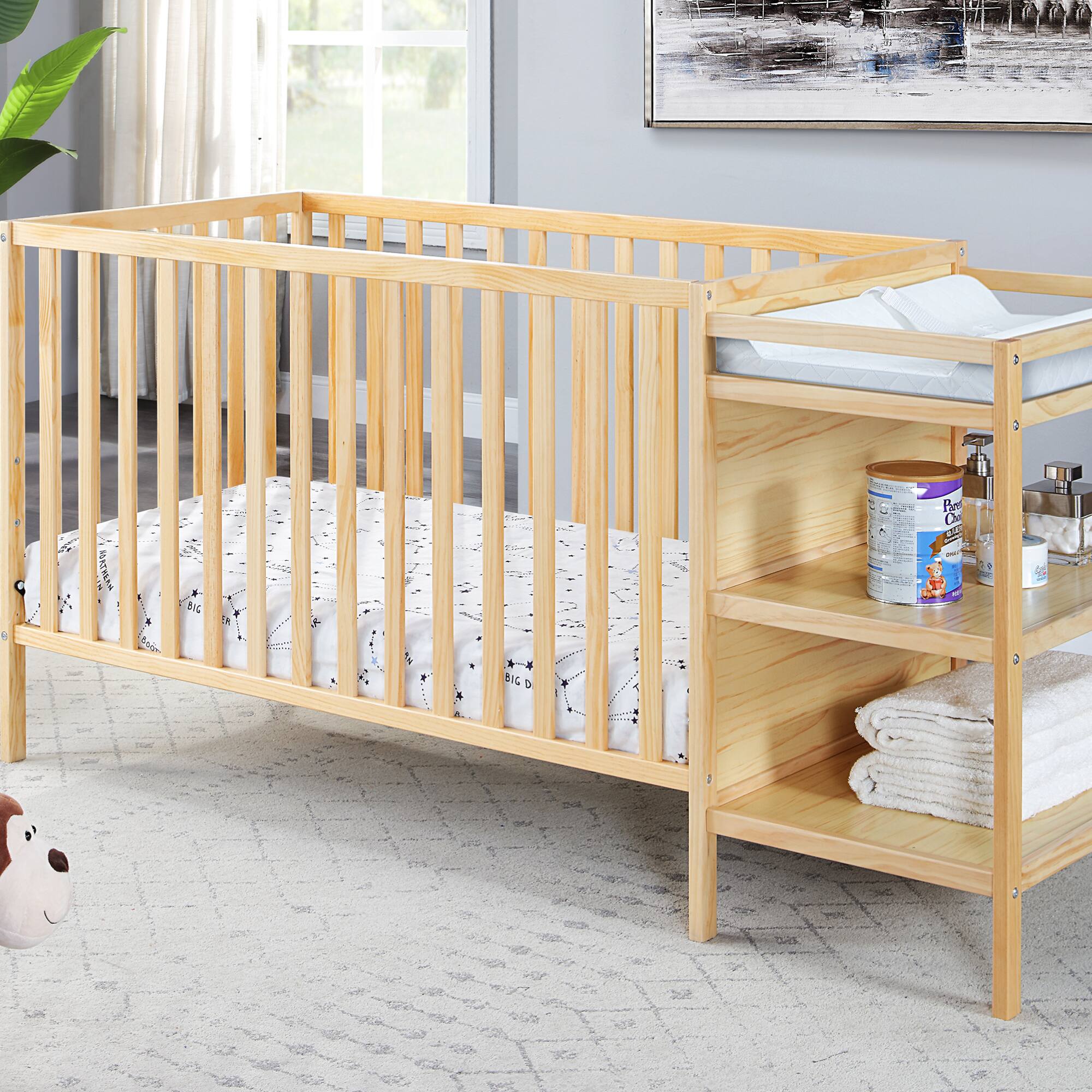 Angle. GOODSILO - 3-in-1 Convertible Crib and Changer Combo with Storage Shelves and Adjustable Mattress Support - Natural.