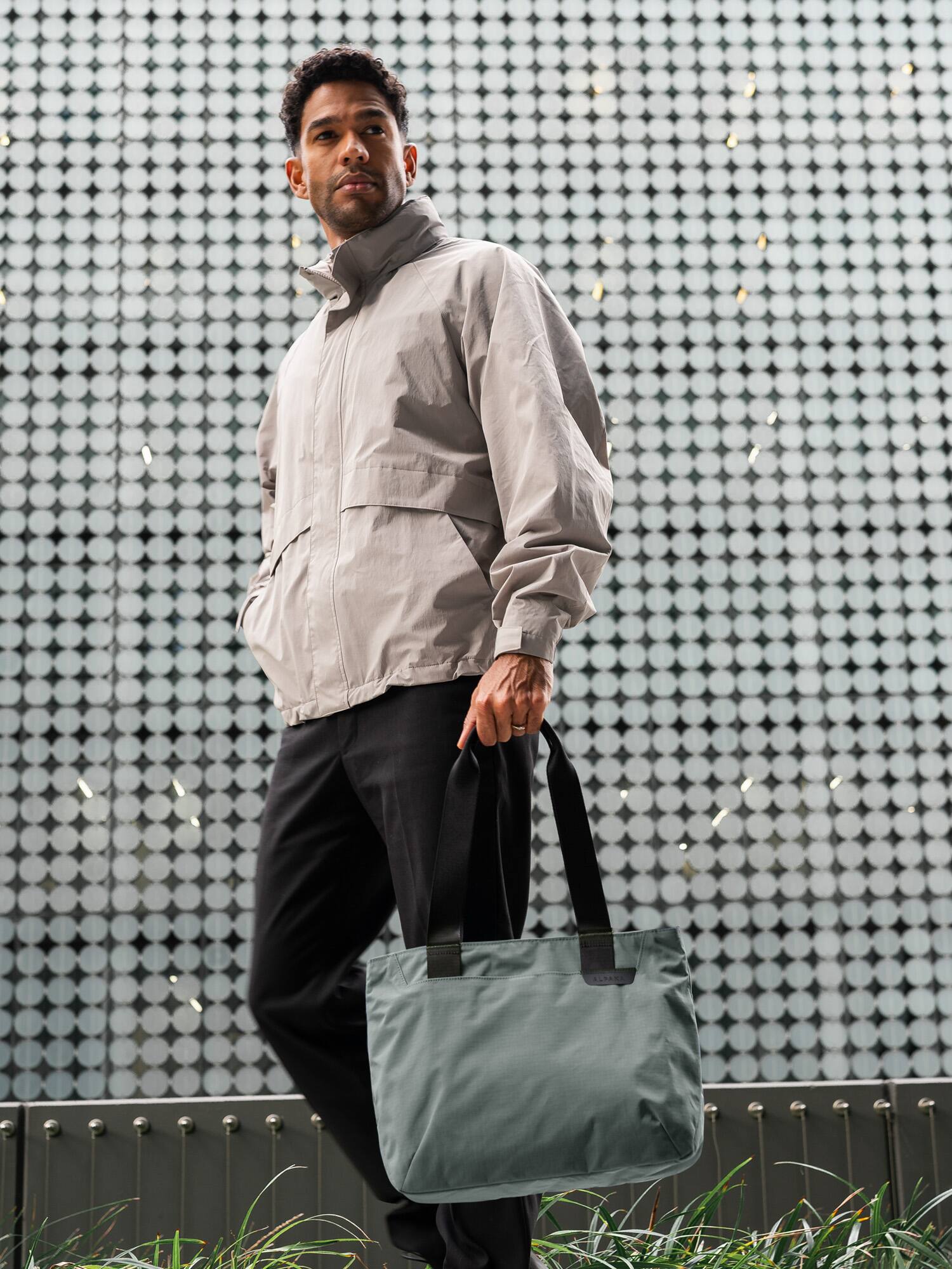 Alt View 2. ALPAKA - Laptop Tote Bag for Work & Travel,20L, Built-in Padded Sleeve for 16" Laptop, Magnetic Open-Top (No Zipper) - Grey Axoflux 210D.